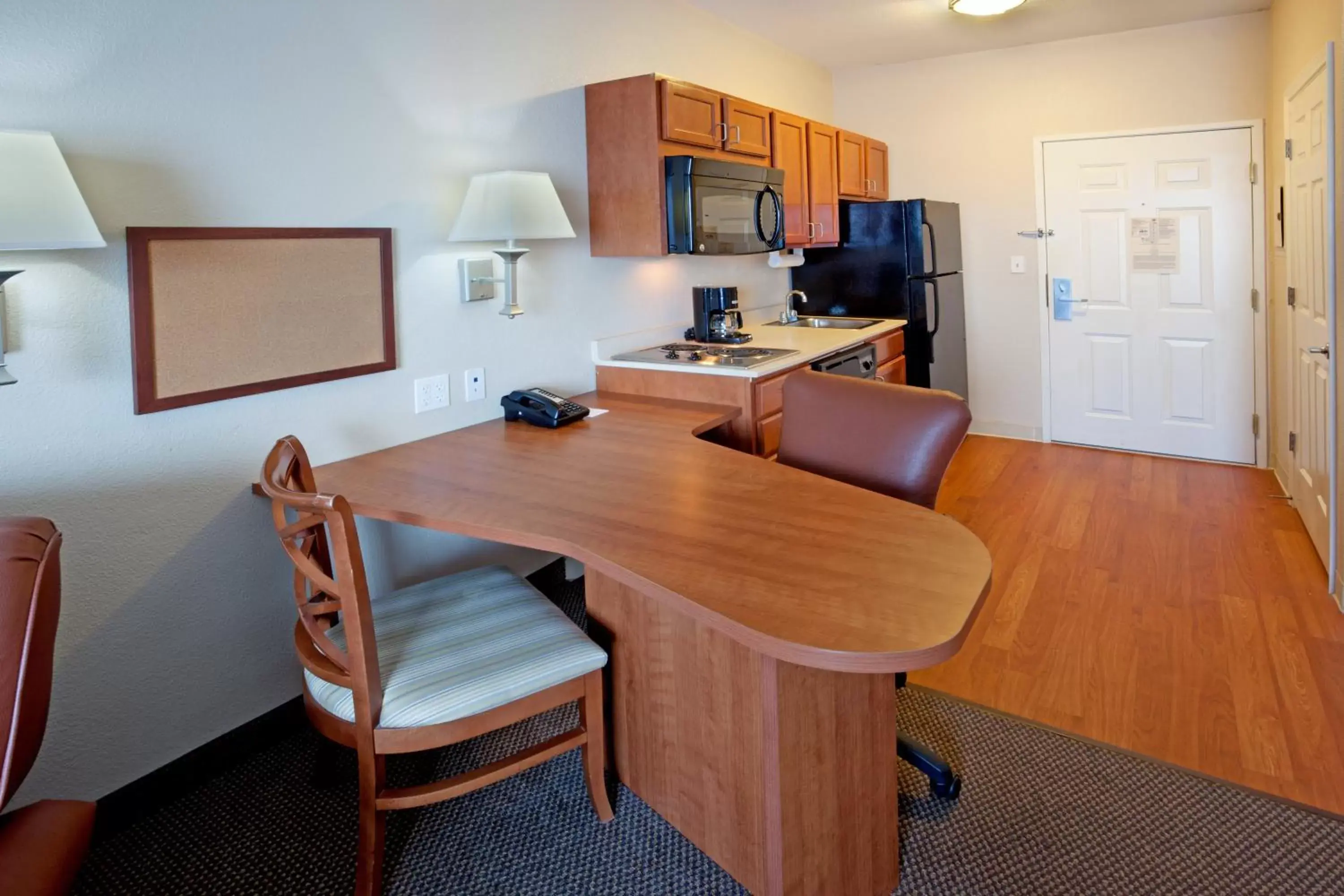 Photo of the whole room, Kitchen/Kitchenette in Candlewood Suites Corpus Christi-SPID, an IHG Hotel