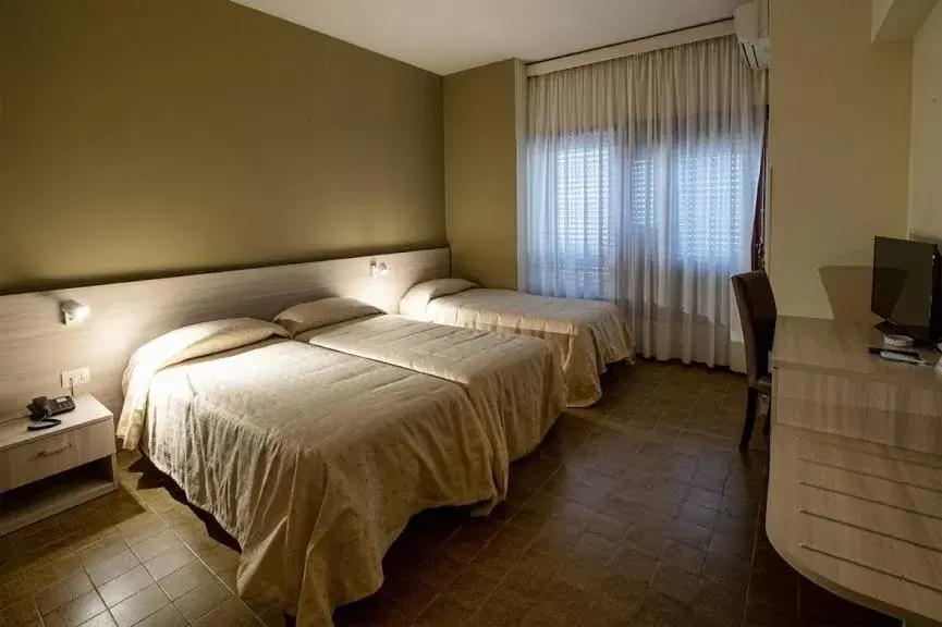 Bed in Hotel Scacciapensieri