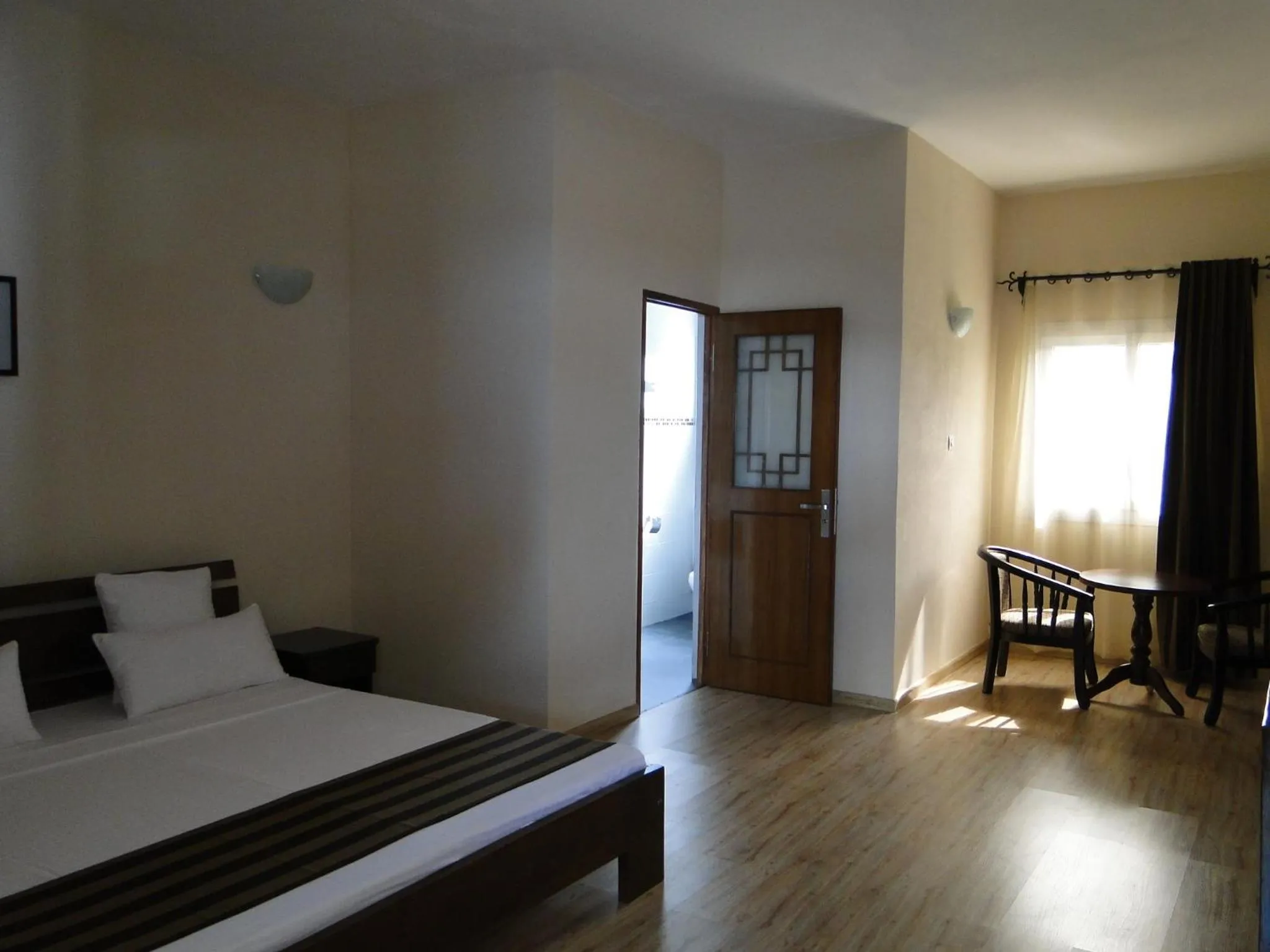 Photo of the whole room, Bed in Hotel H1 Antsirabe