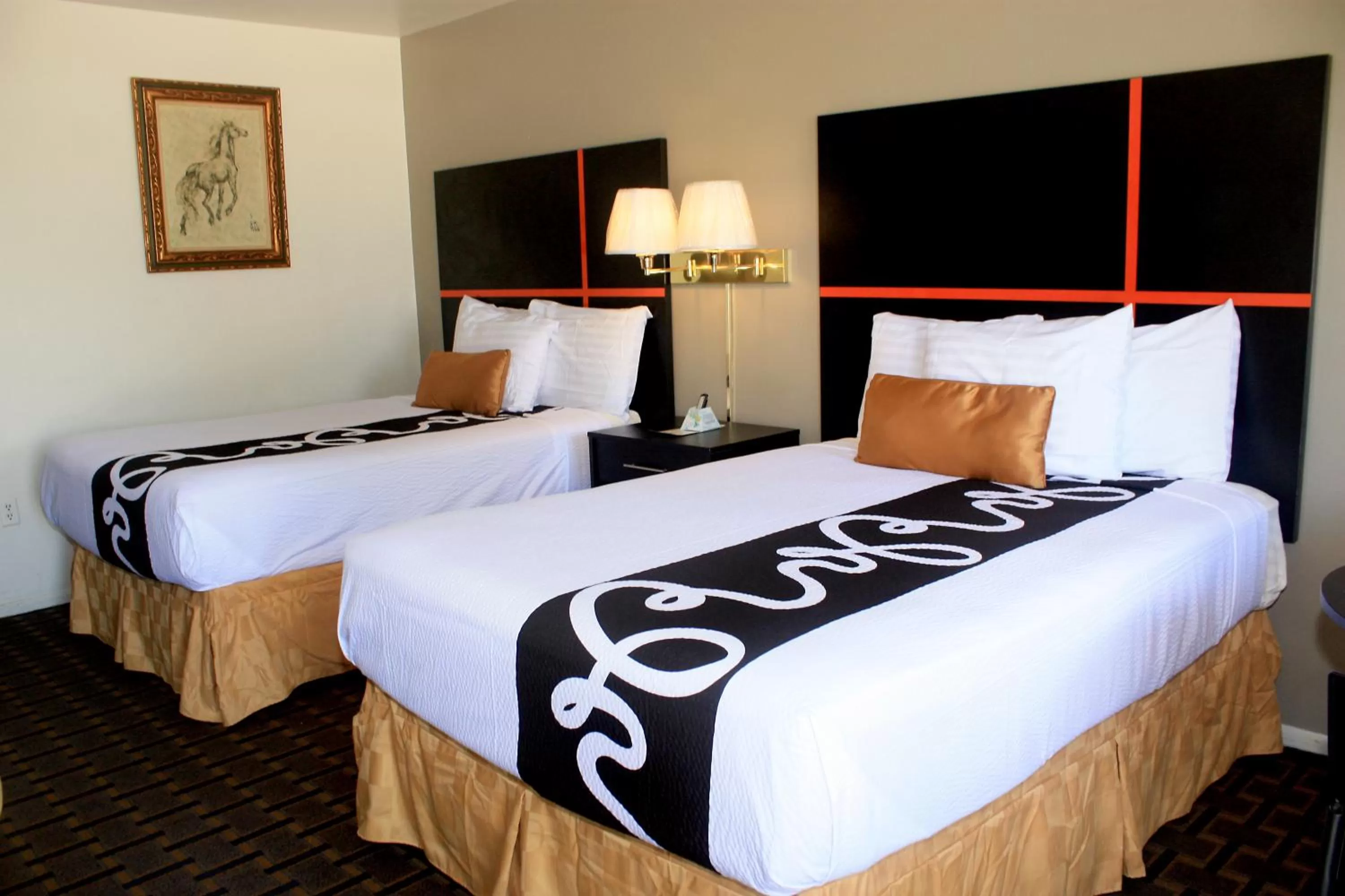 Bed in Chaparral Motor Inn