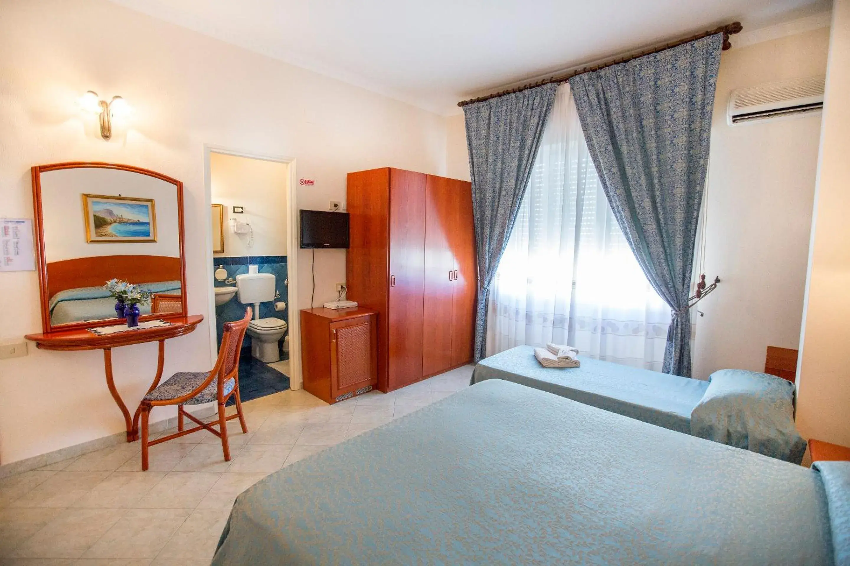 Bed in Hotel Mediterraneo