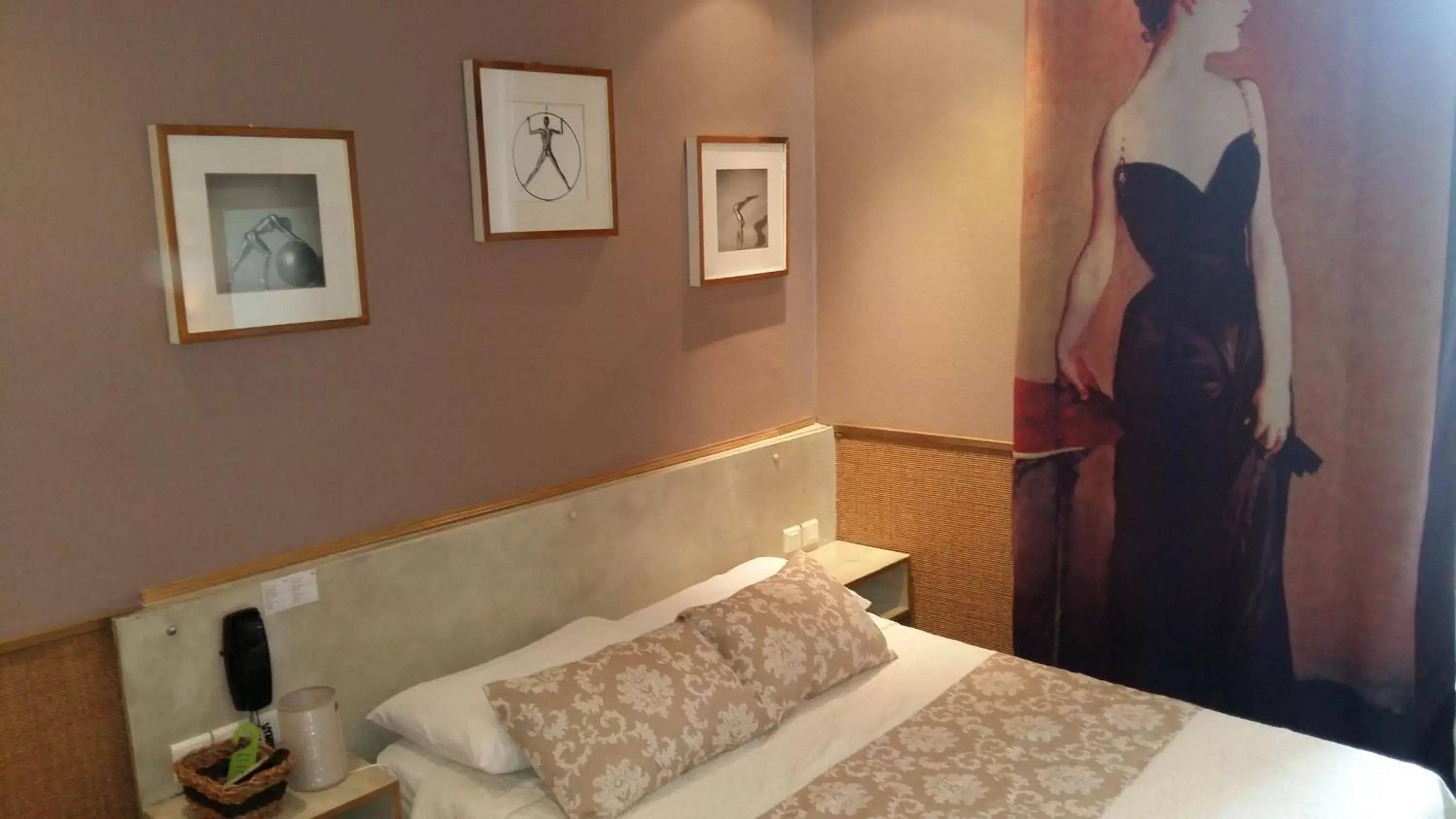 Bed in Hotel Mignon Bed in Hotel Mignon