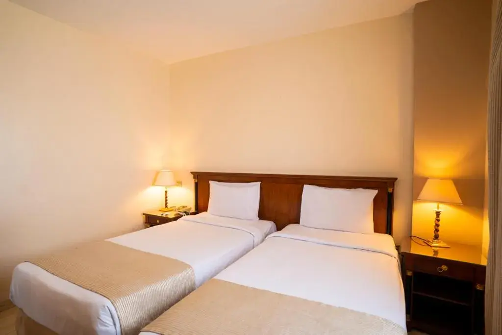 Bed in Swiss Inn Nile Hotel
