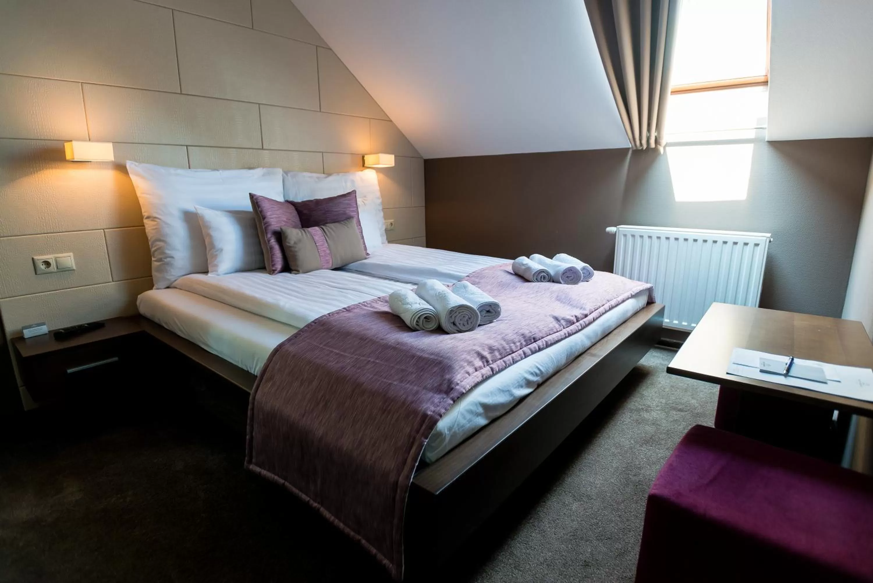 Bed in Hotel Fürdőház