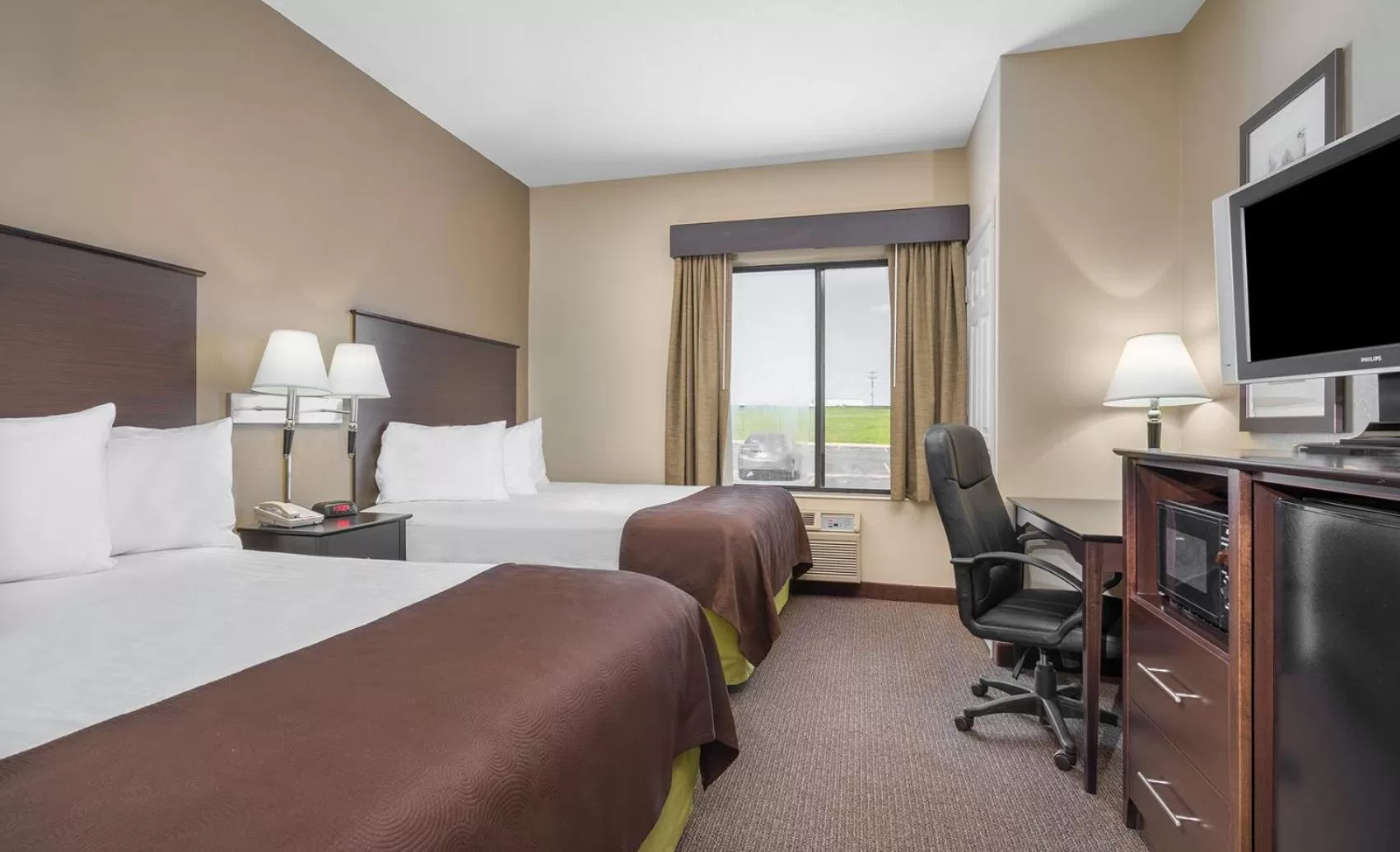 Photo of the whole room, Bed in AmericInn by Wyndham Rochester