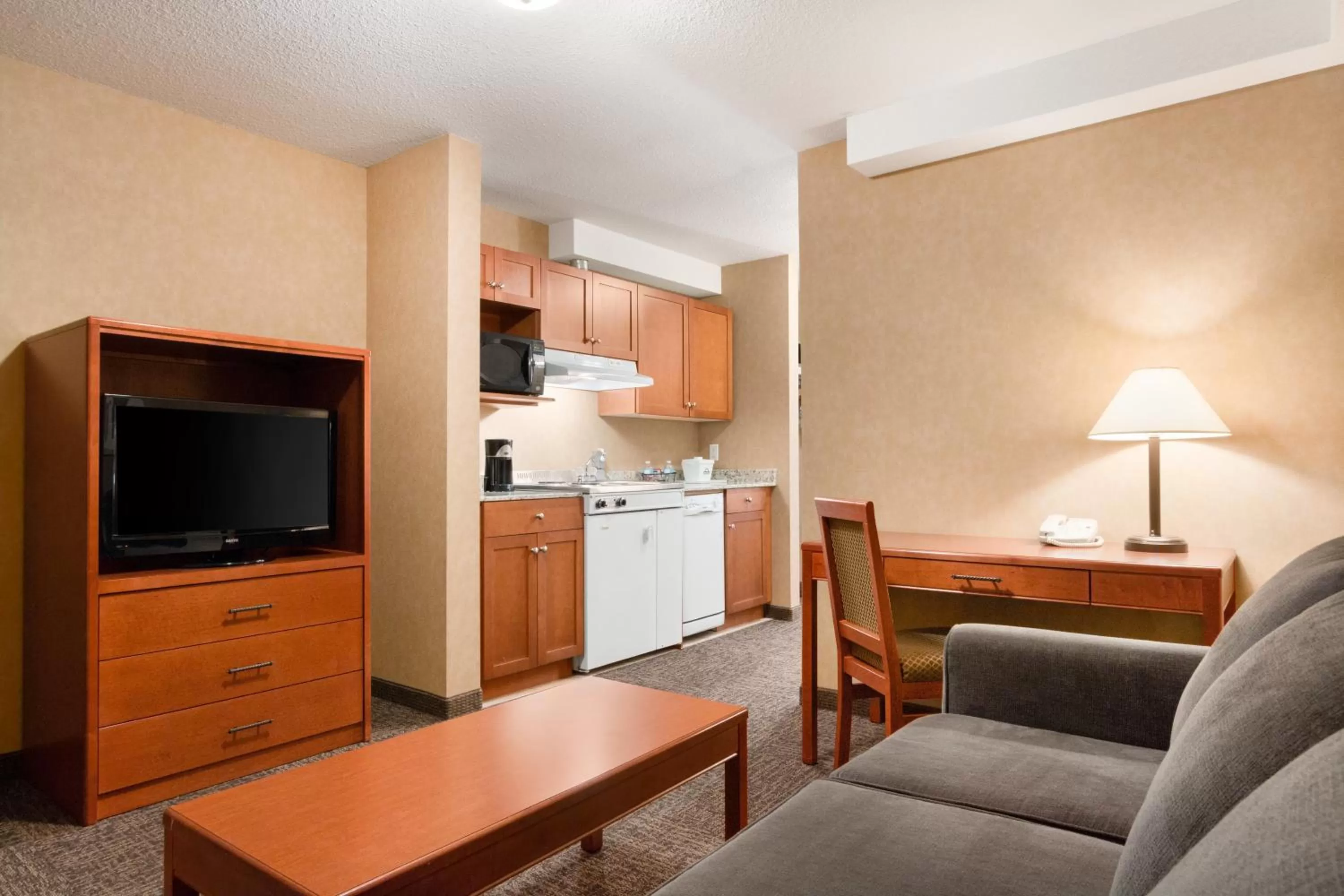 TV and multimedia in Days Inn & Suites by Wyndham Cochrane