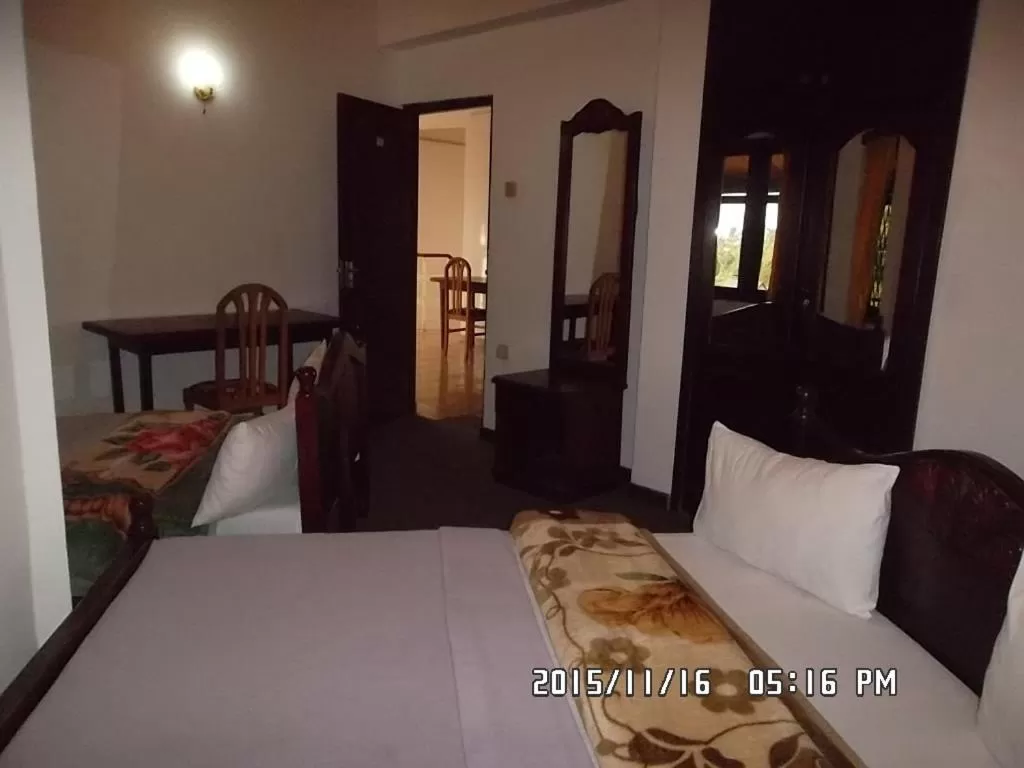 Bed in Panorama Accommodations Nuwara Eliya