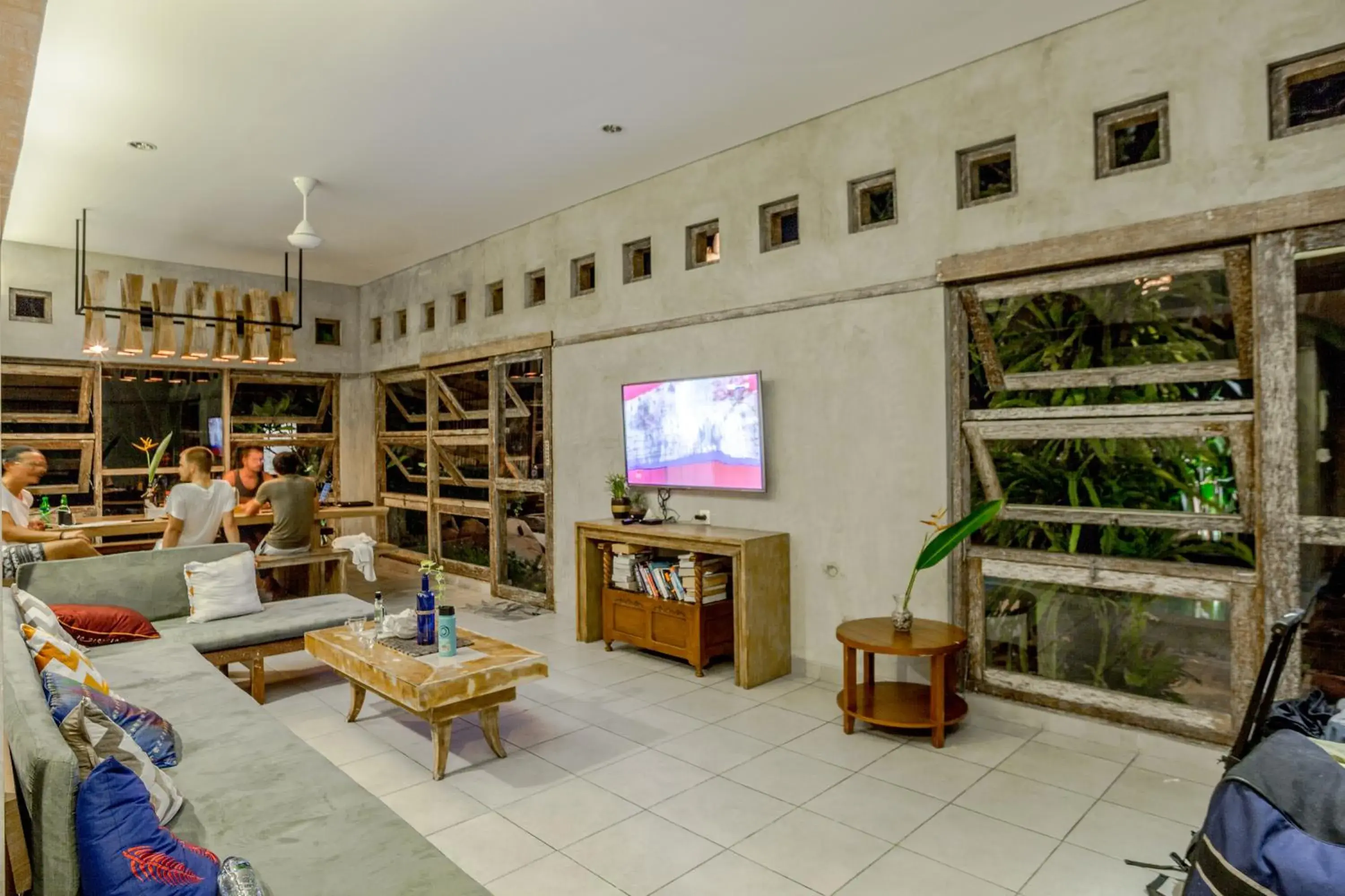 Communal lounge/ TV room in Lokal Bali Hostel