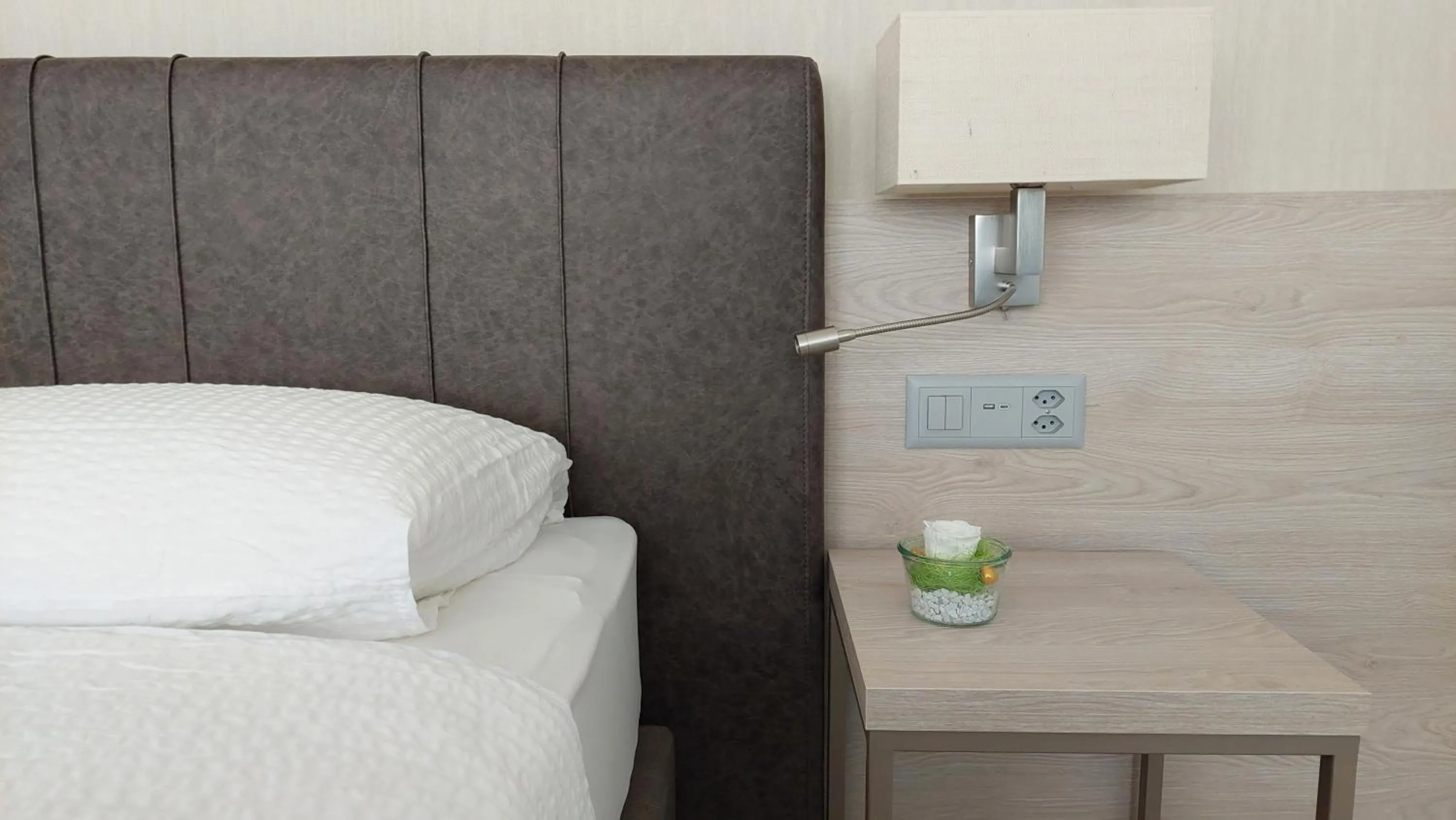 Bed in Hotel Nessi Locarno