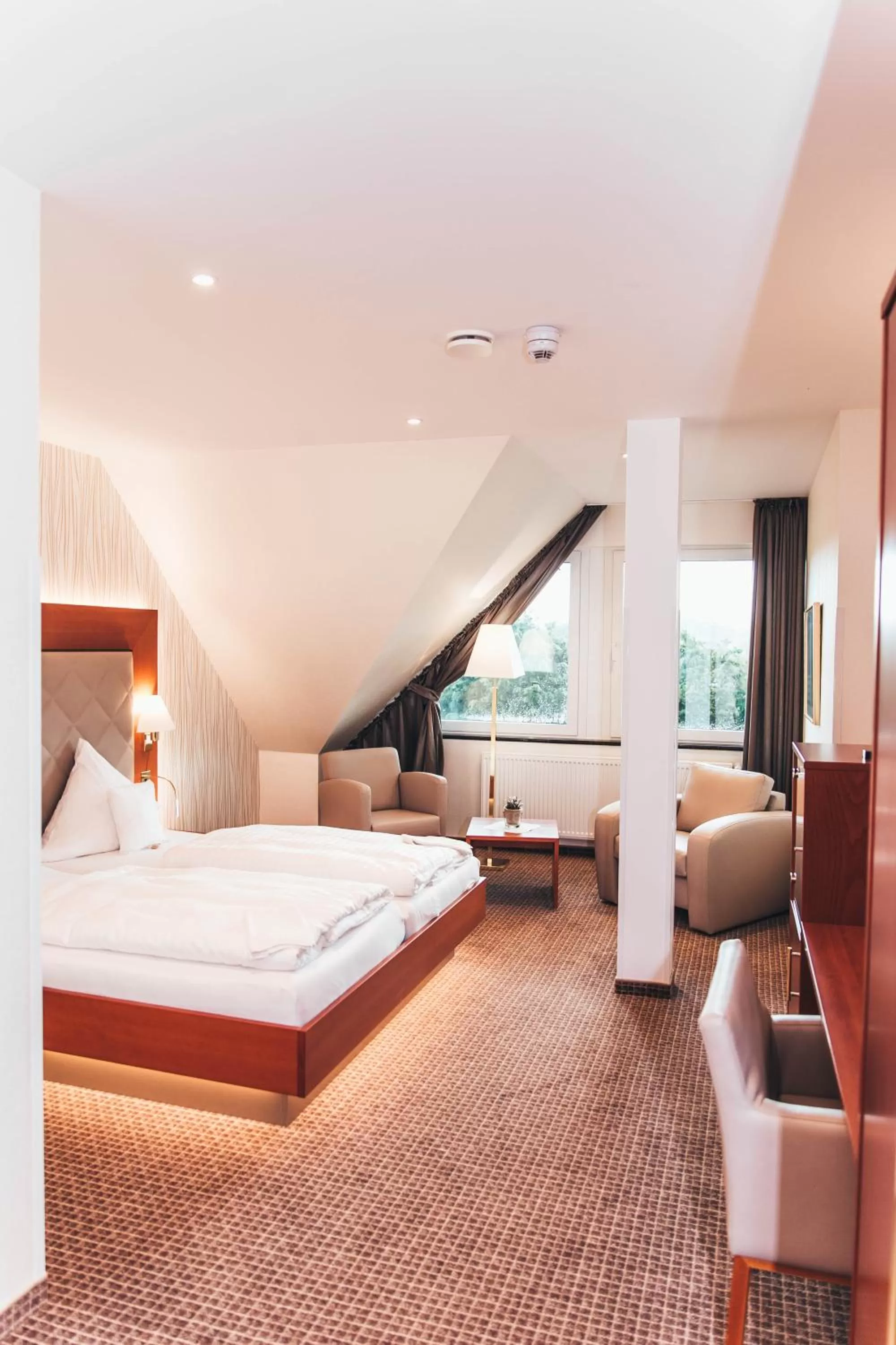 Photo of the whole room, Bed in Ringhotel Teutoburger Wald