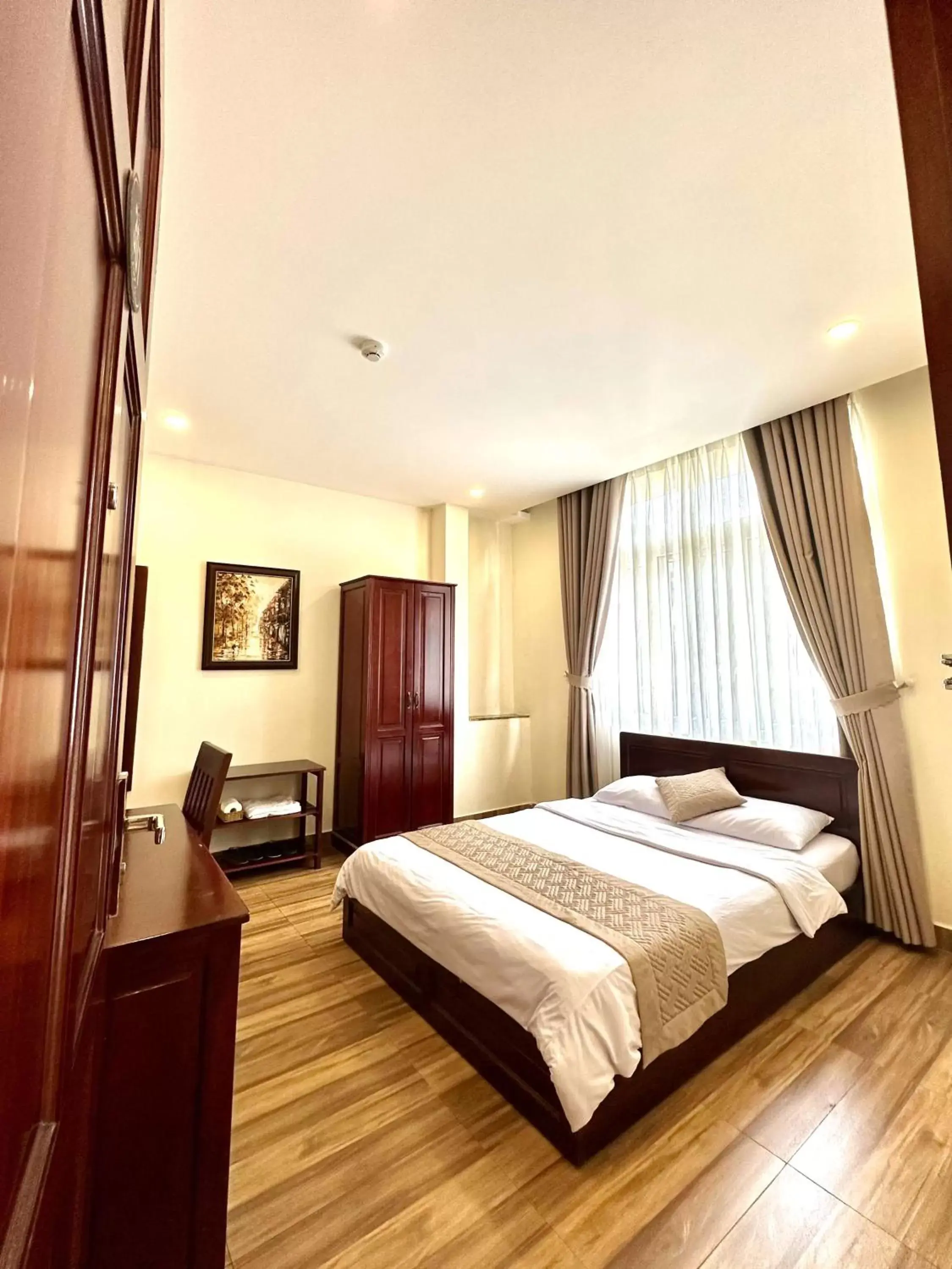 Photo of the whole room, Bed in Nam Xuan Premium Hotel