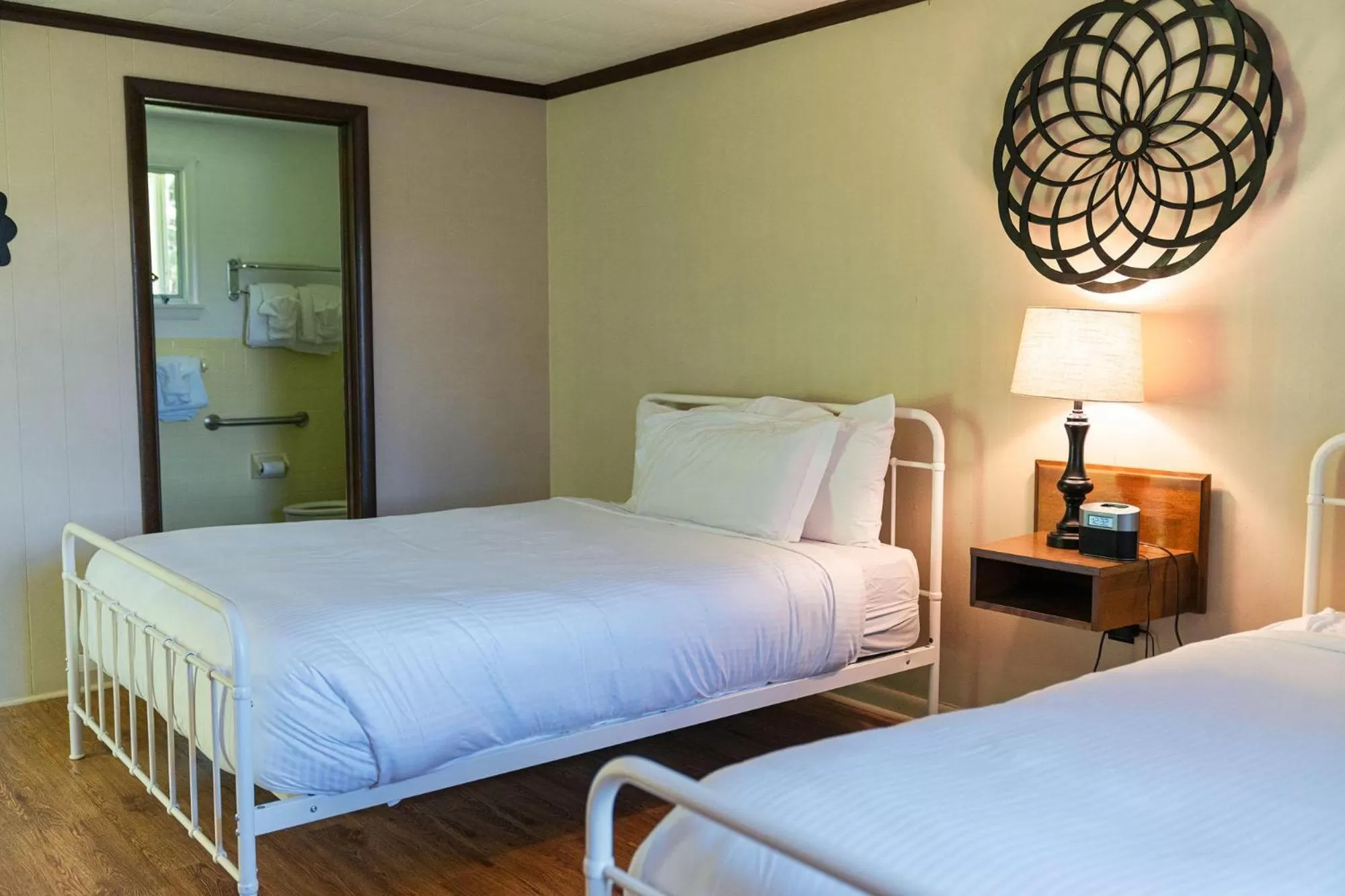 Bed in Whispering Winds Motel