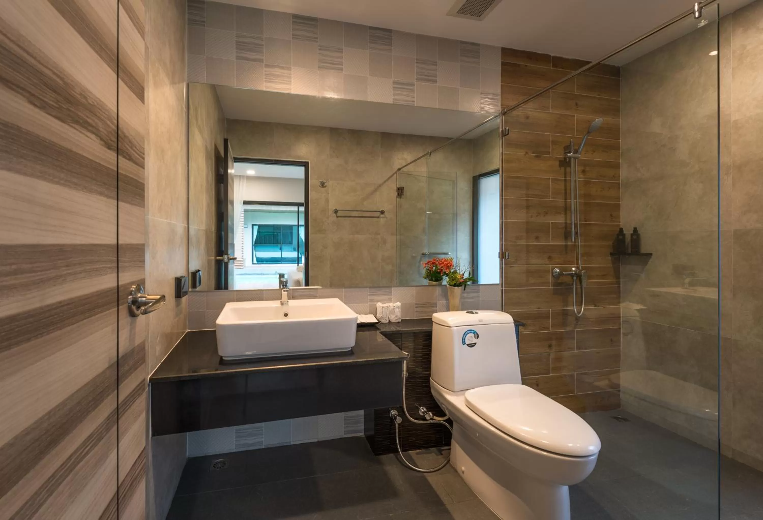 Shower in Cher​mantra​ Aonang​ Resort & Pool​ Suite