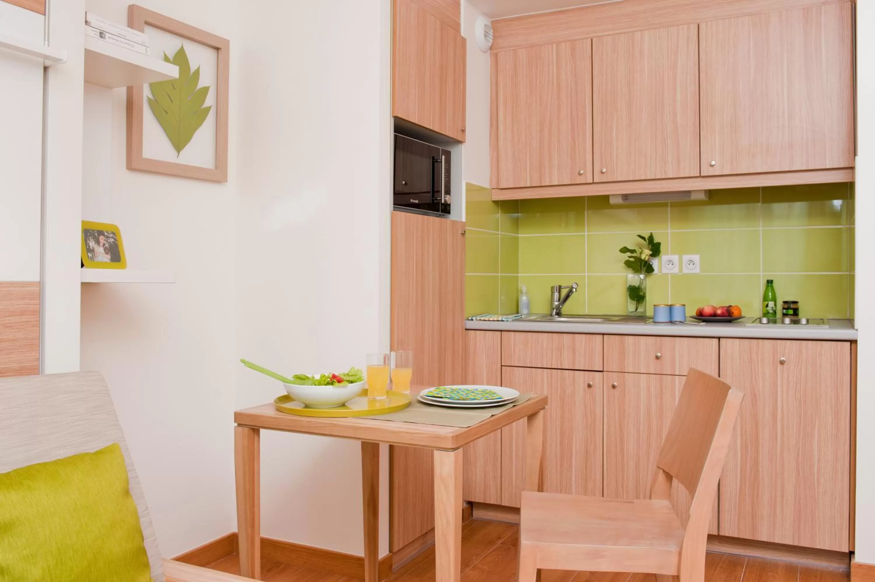 Kitchen or kitchenette in Aparthotel Adagio Paris Vincennes