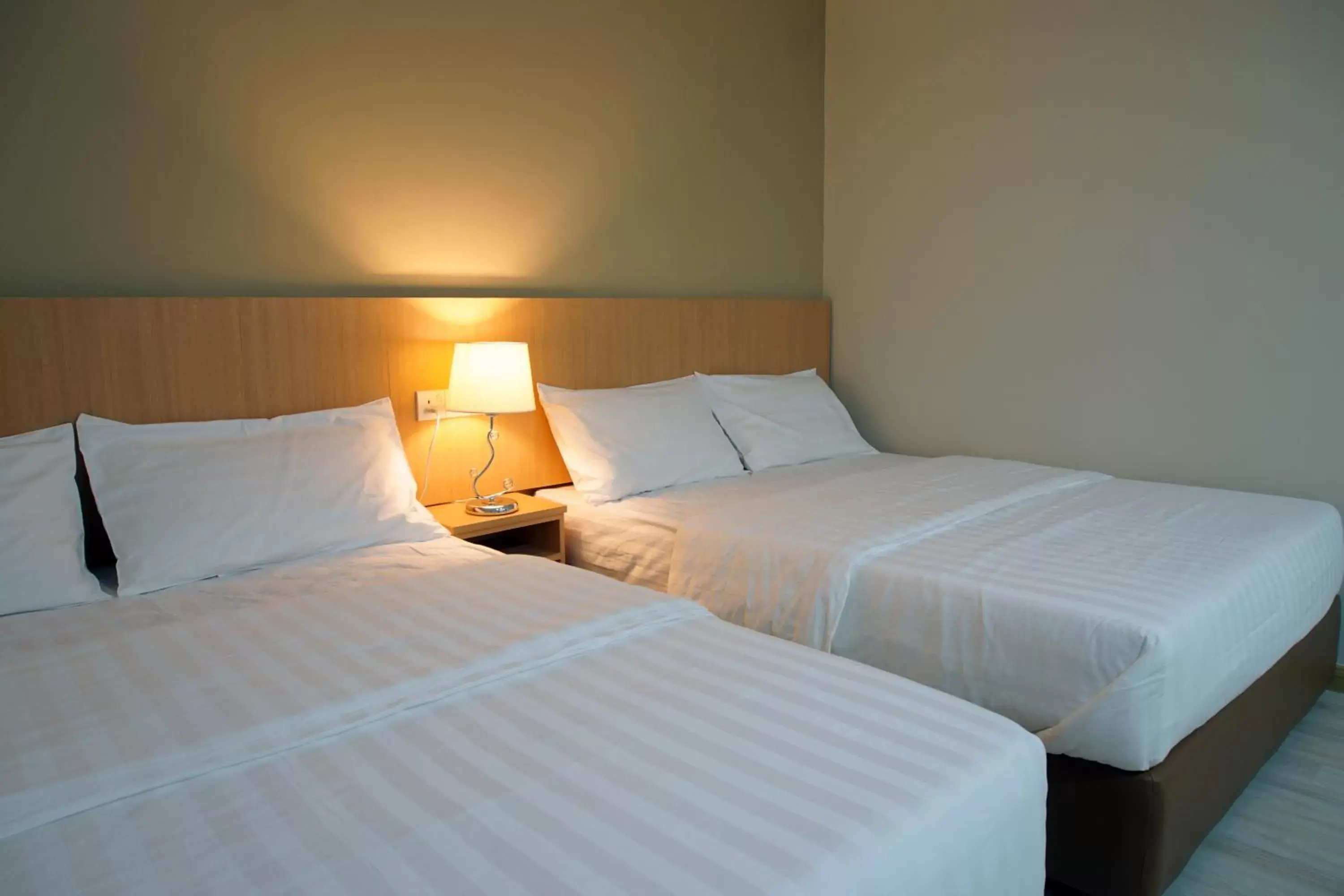 Bed in Labuan Avenue Hotel