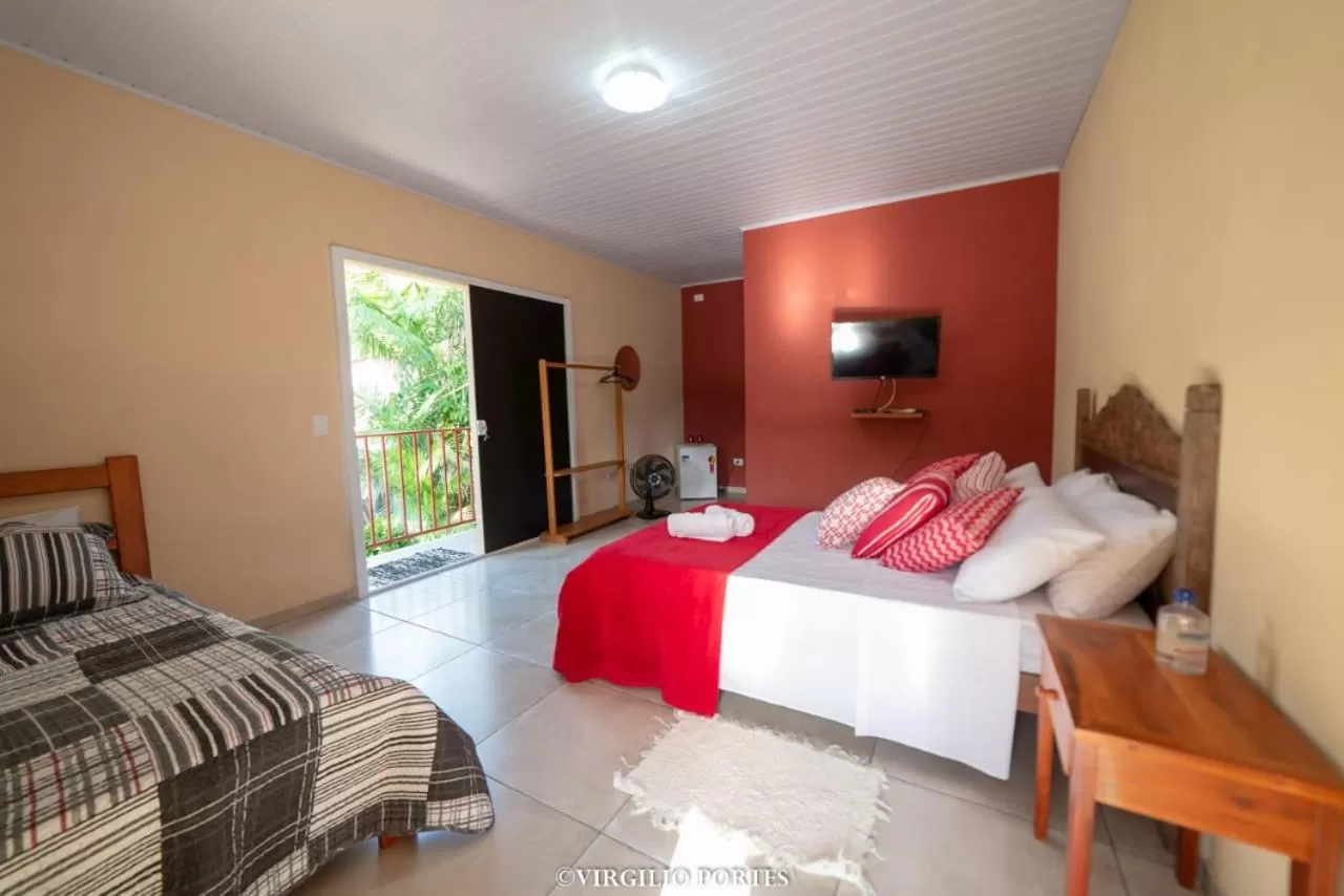 Bed in Pousada Recanto da Lu