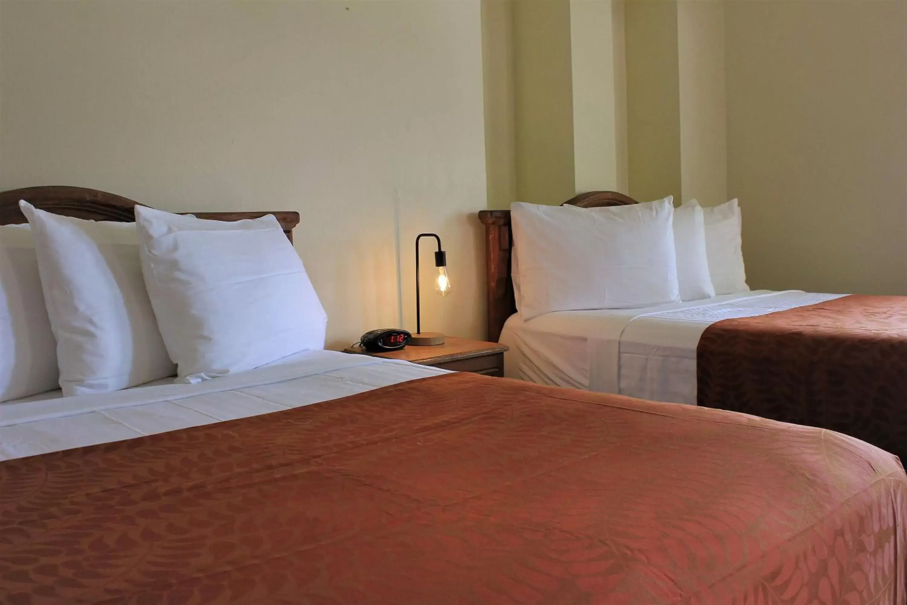 Bedroom, Bed in Mayaguez Plaza Hotel; SureStay Collection by Best Western