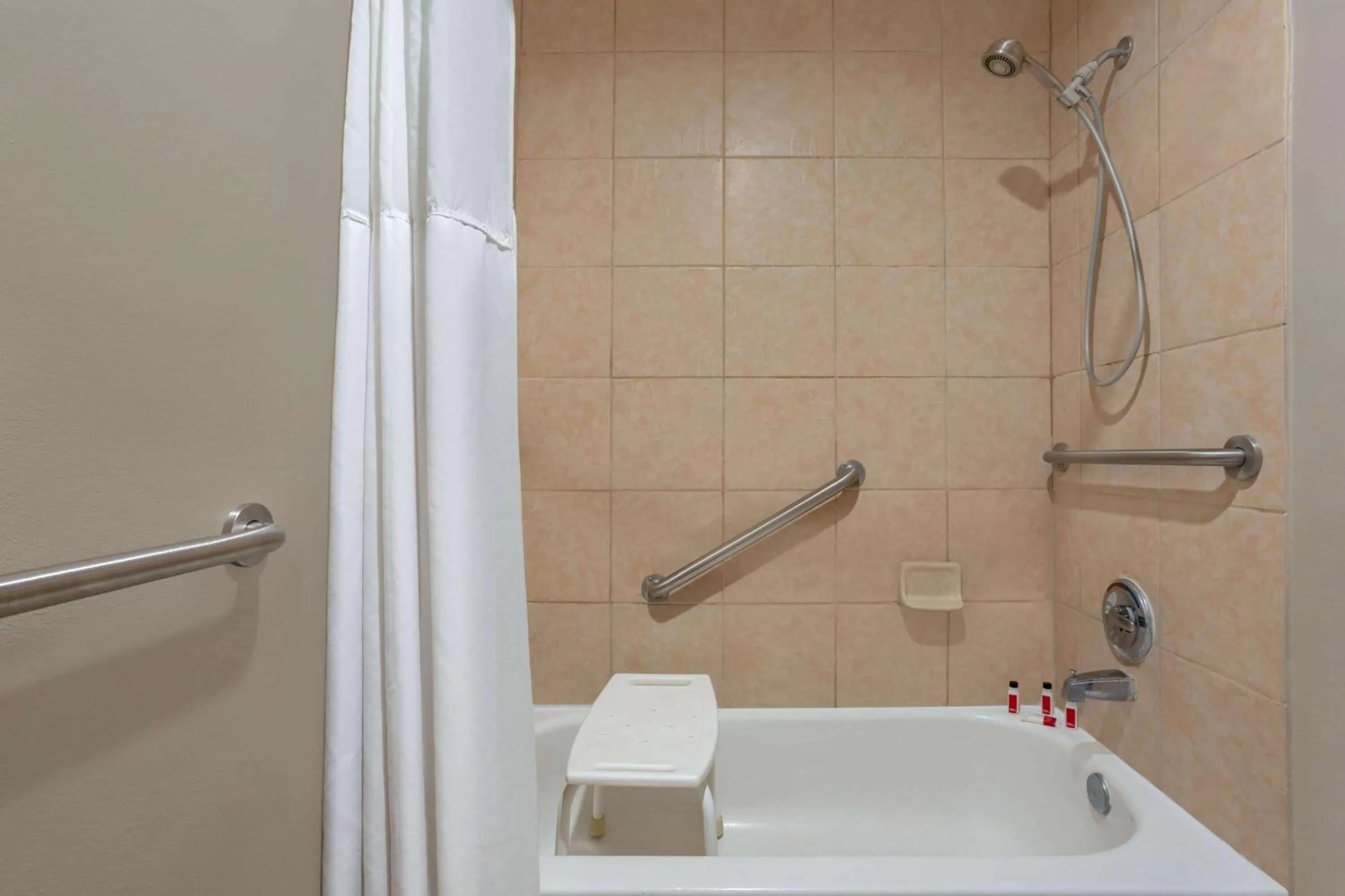 Bathroom in Super 8 by Wyndham Universal City