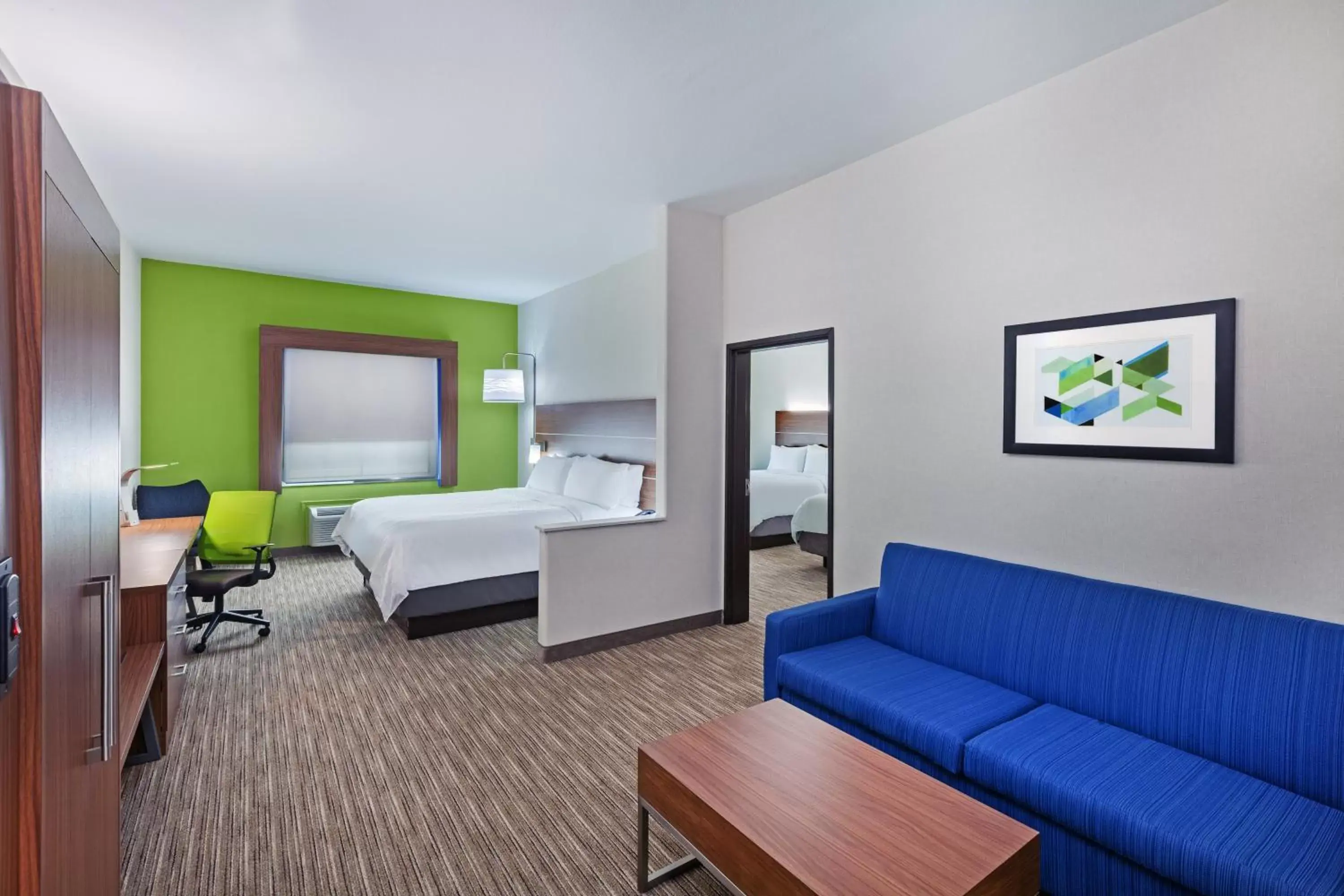 Bedroom, Seating Area in Holiday Inn Express & Suites Longview South I-20, an IHG Hotel