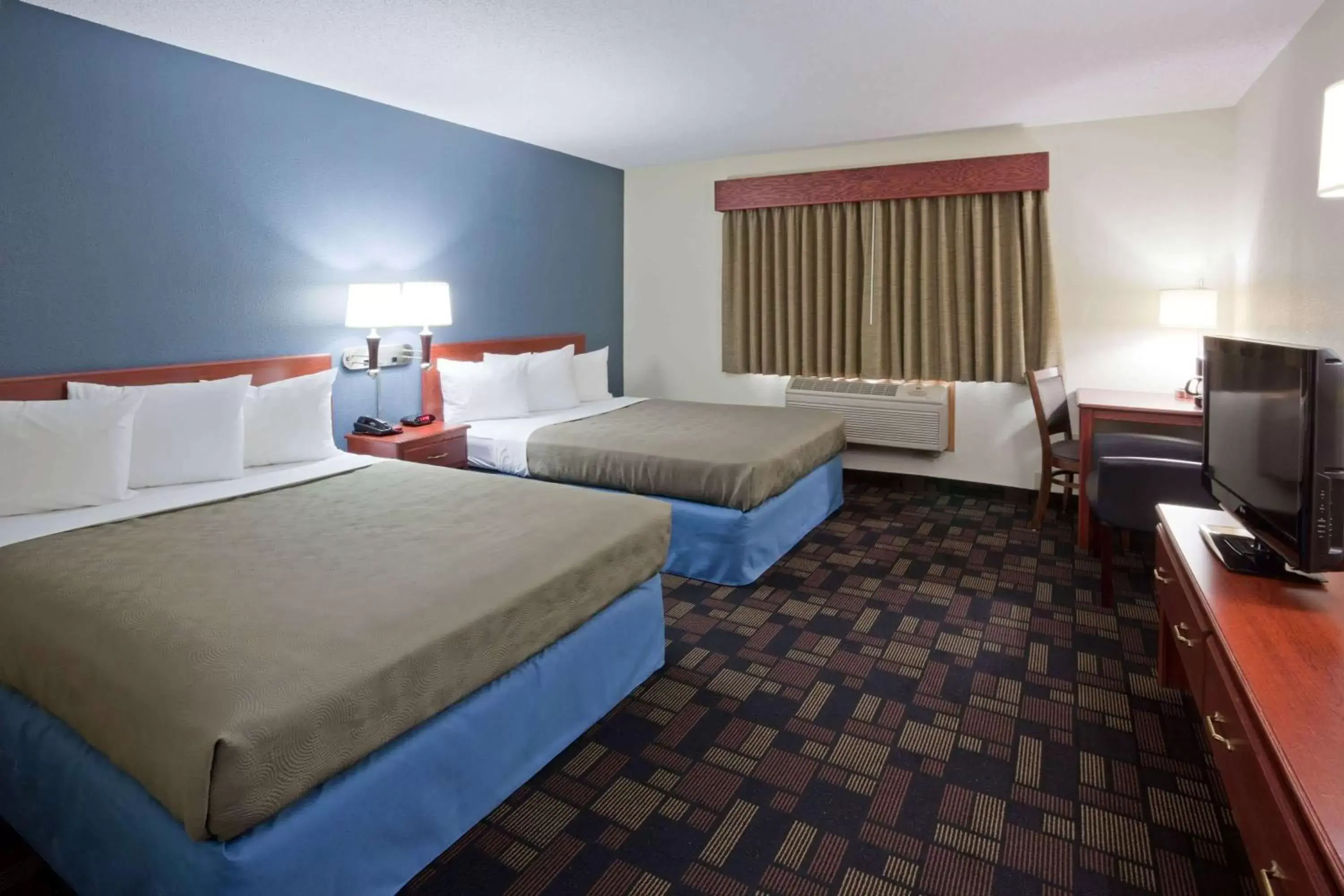 Photo of the whole room, Bed in AmericInn by Wyndham Austin