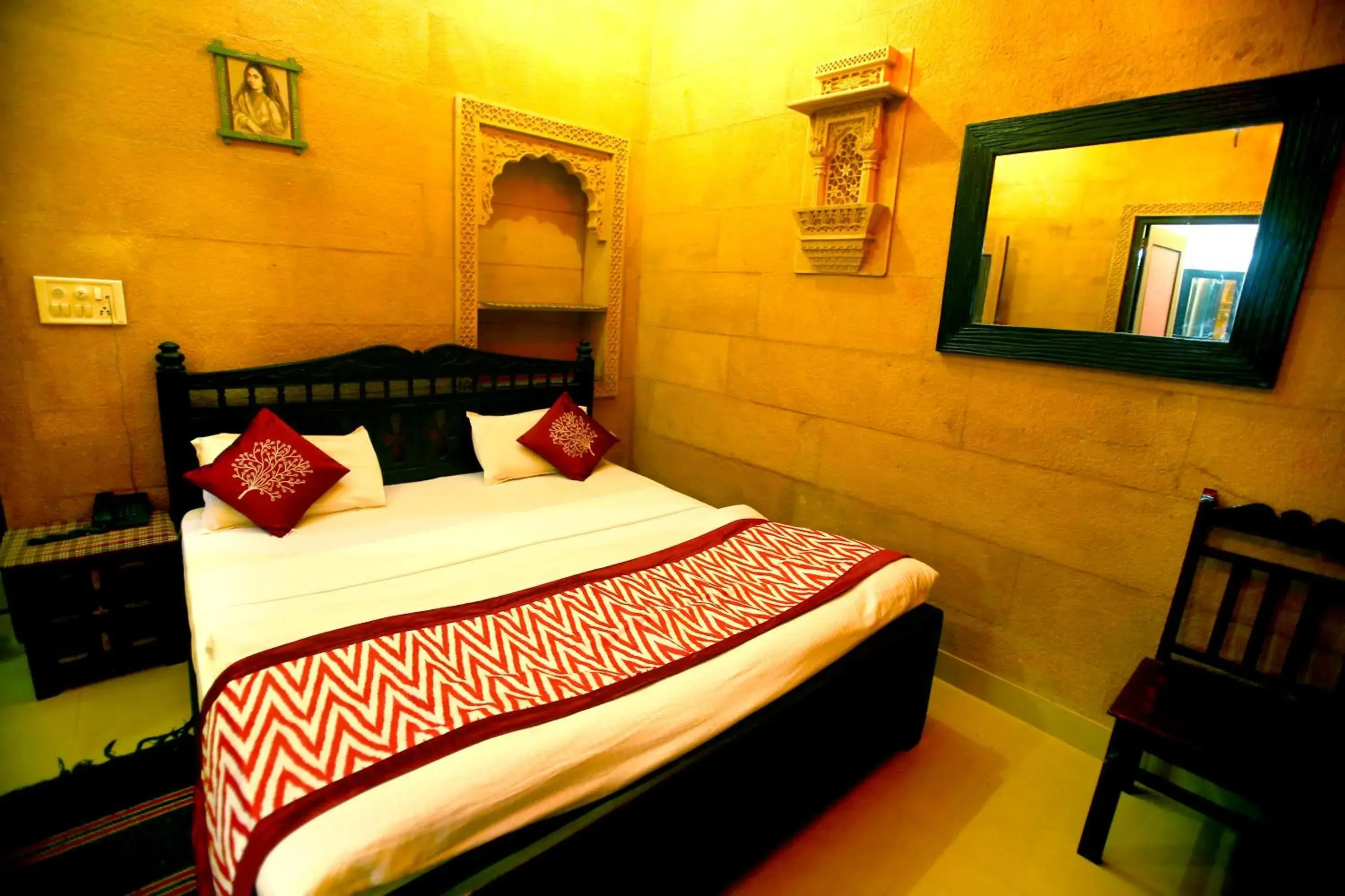 Bed in Hotel Royal Haveli