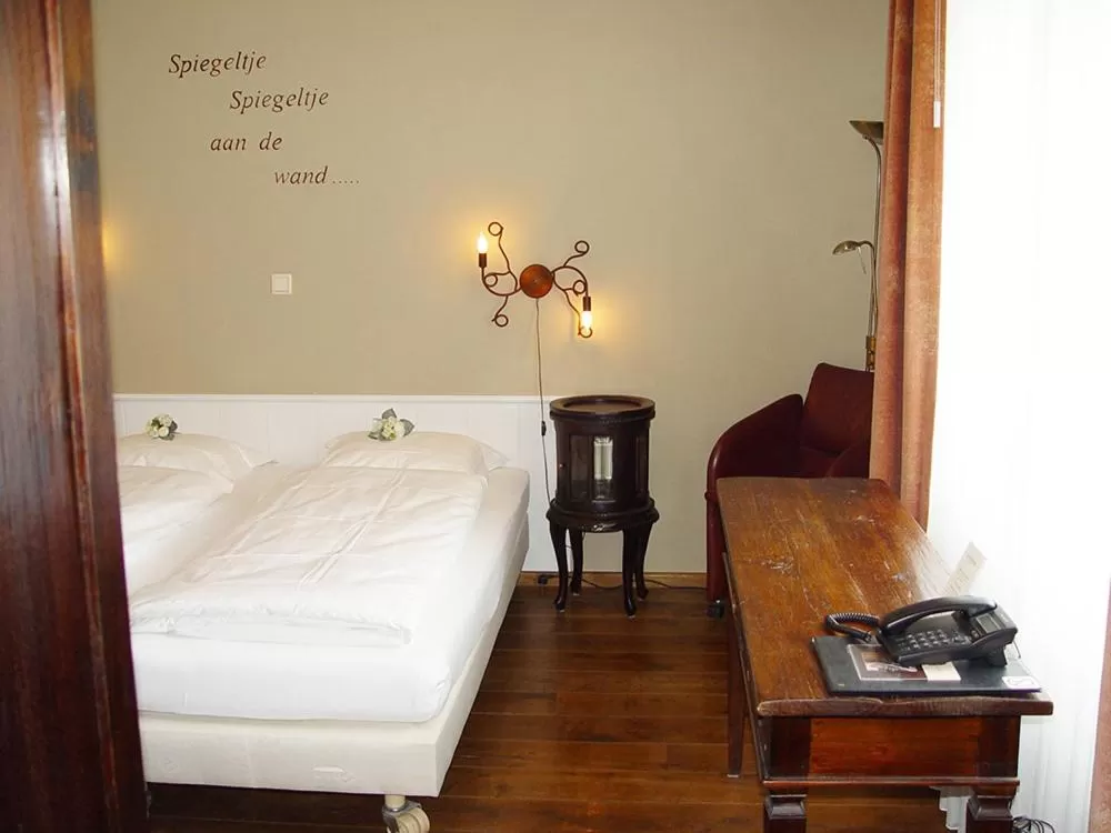 Bed in Hotel Huys van Heusden