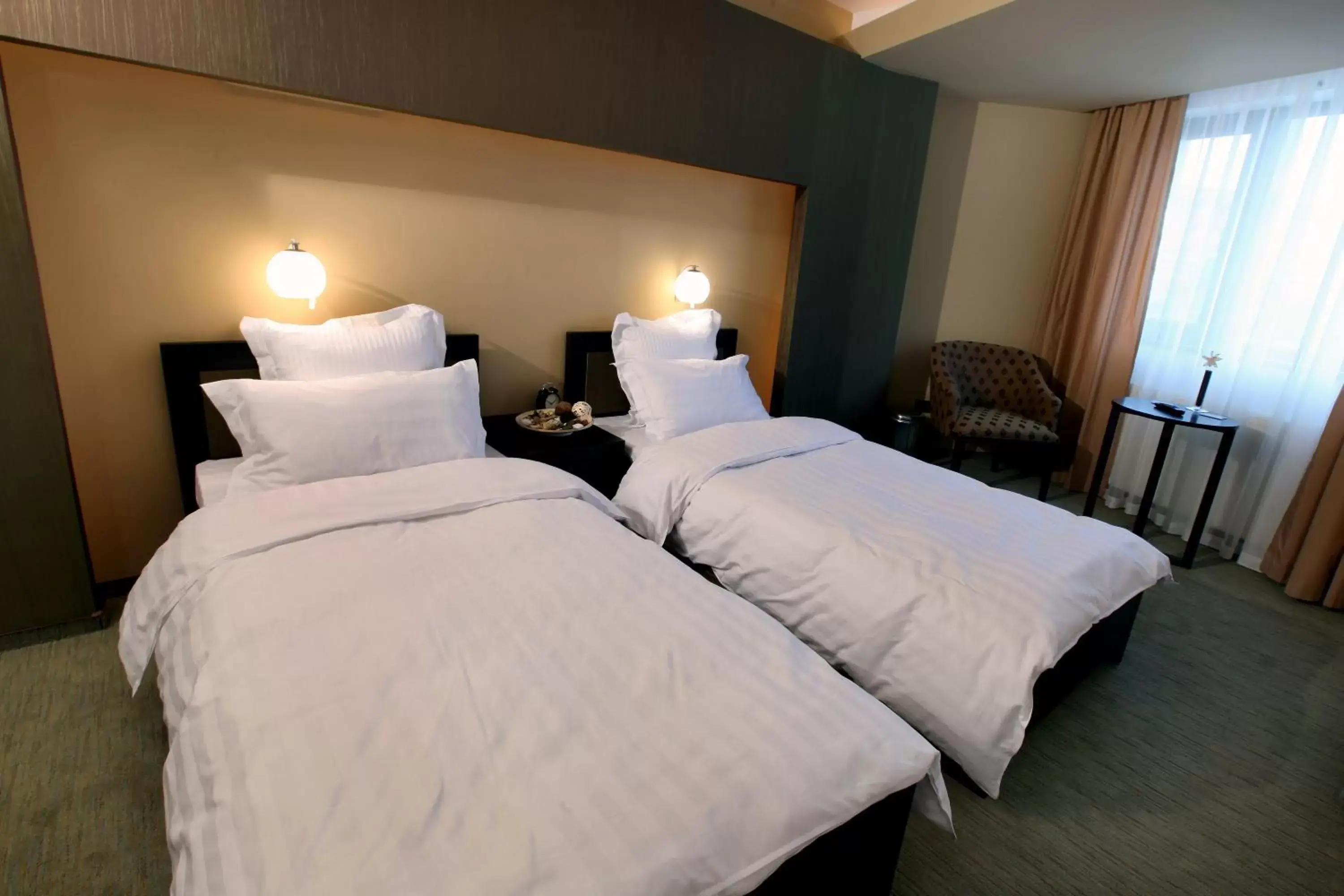 Bed in Ambiance Hotel