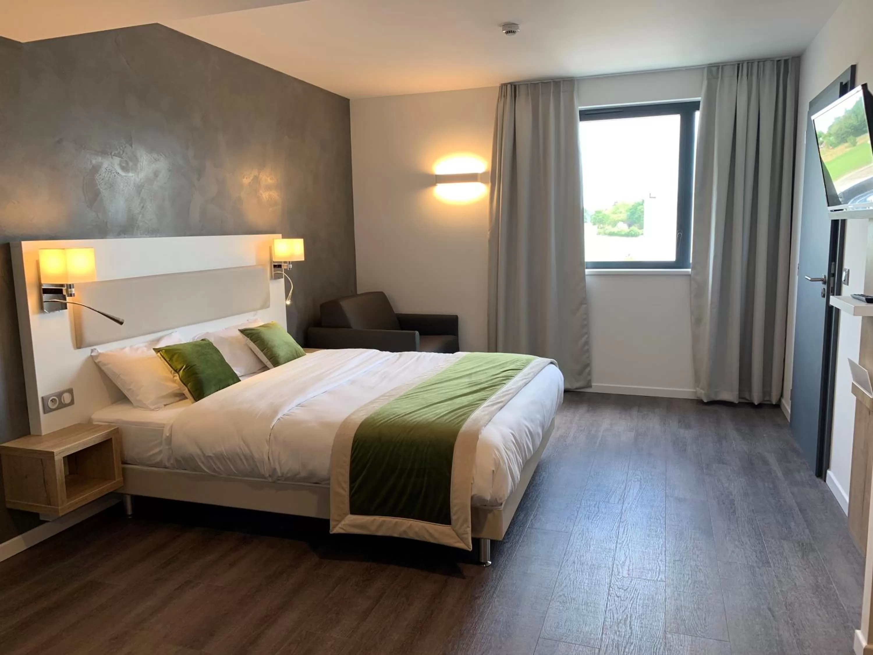 Bed in ATOLON PARK HOTEL