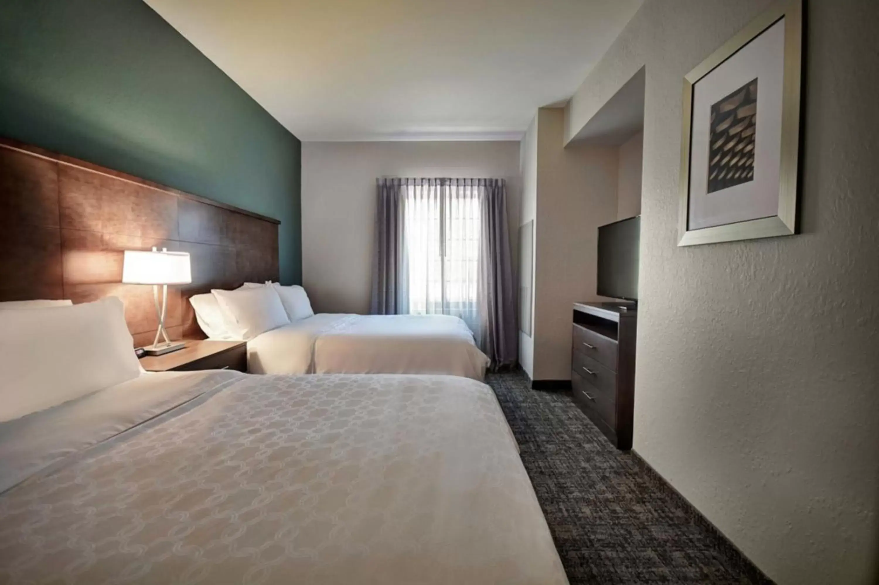 Bed in Staybridge Suites - Southgate - Detroit Area by IHG Bed in Staybridge Suites - Southgate - Detroit Area by IHG