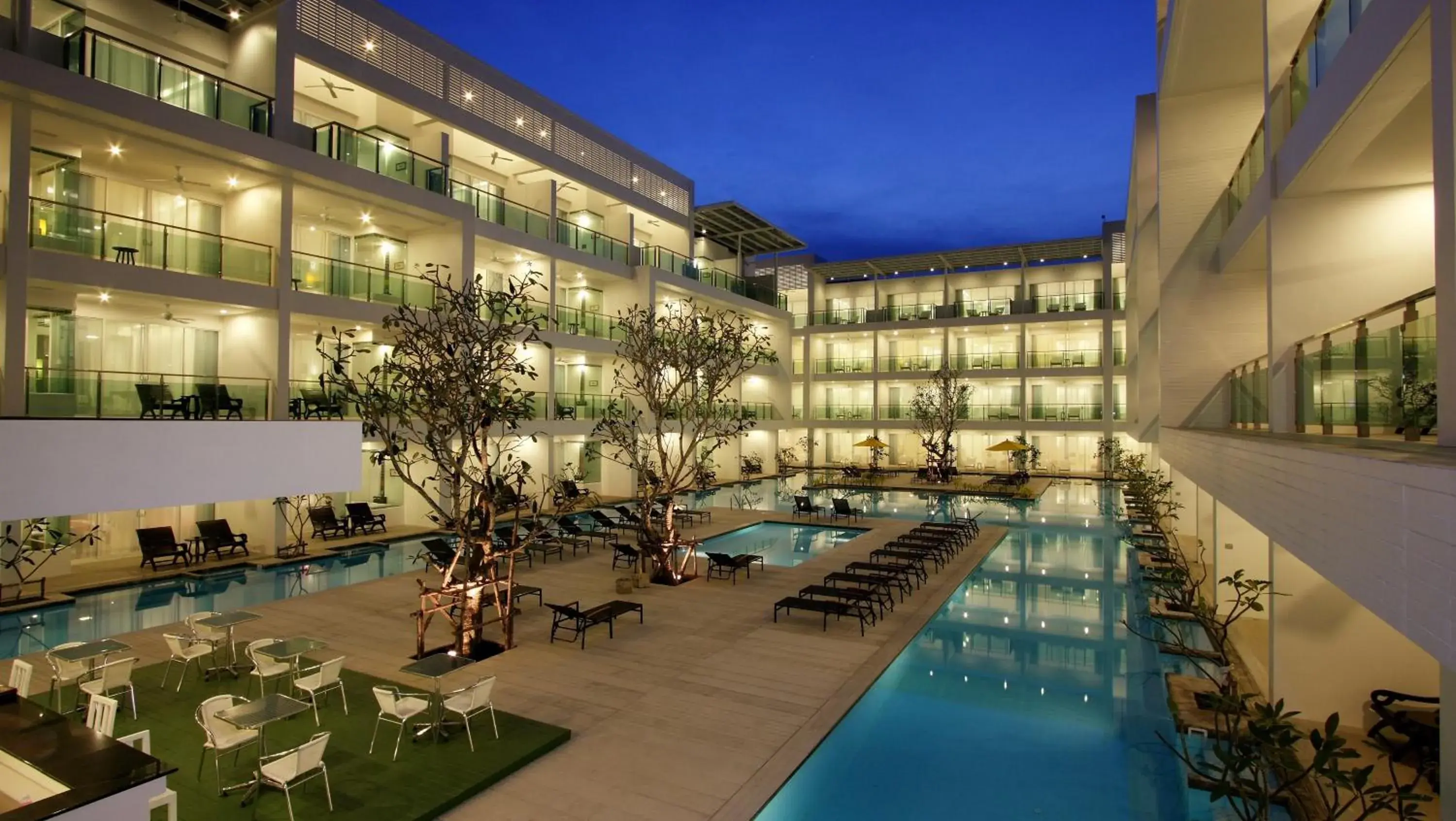 Pool view in The Old Phuket - Karon Beach Resort - SHA Plus Pool view in The Old Phuket - Karon Beach Resort - SHA Plus