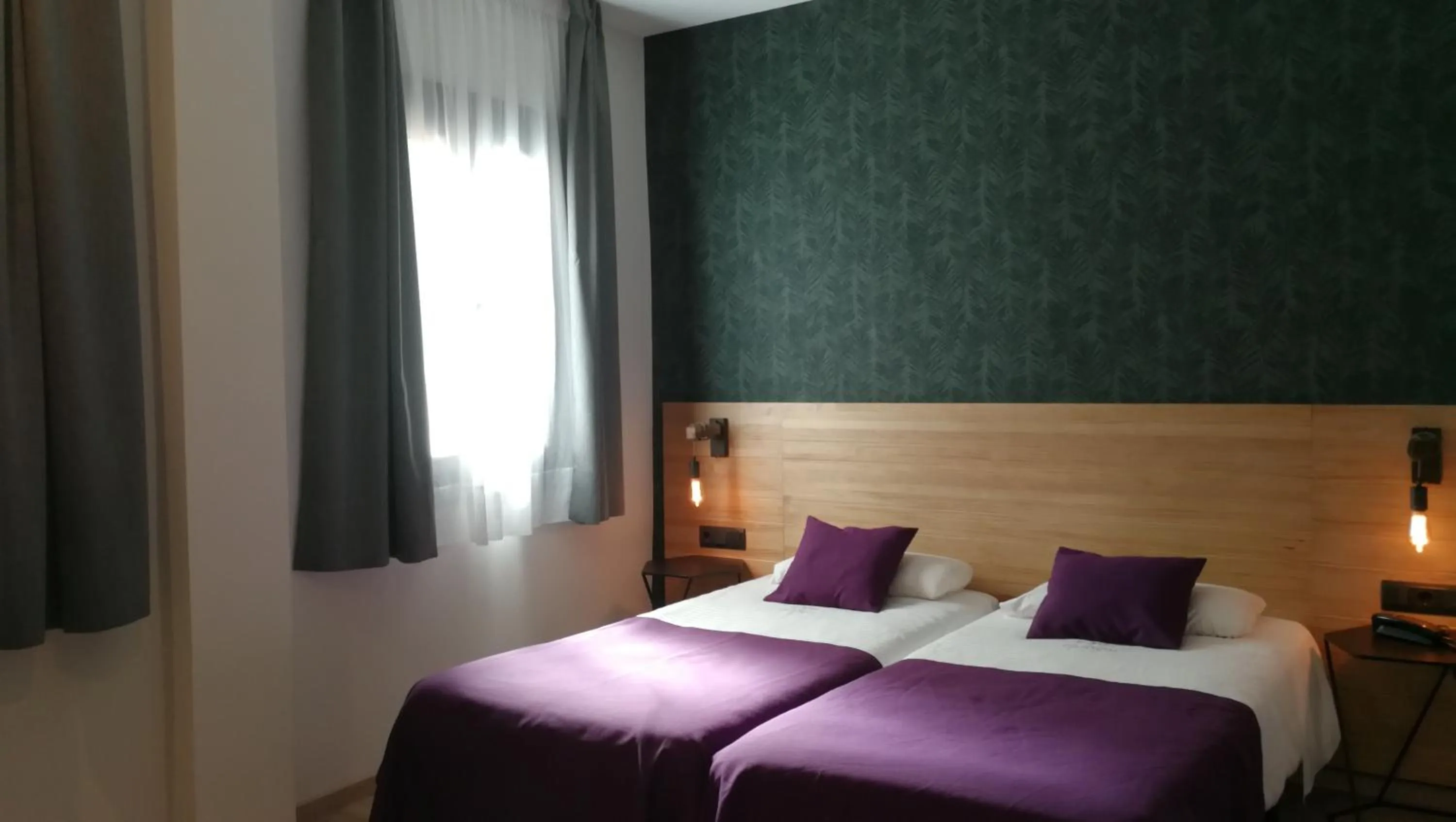 Bed in Hotel Cantón