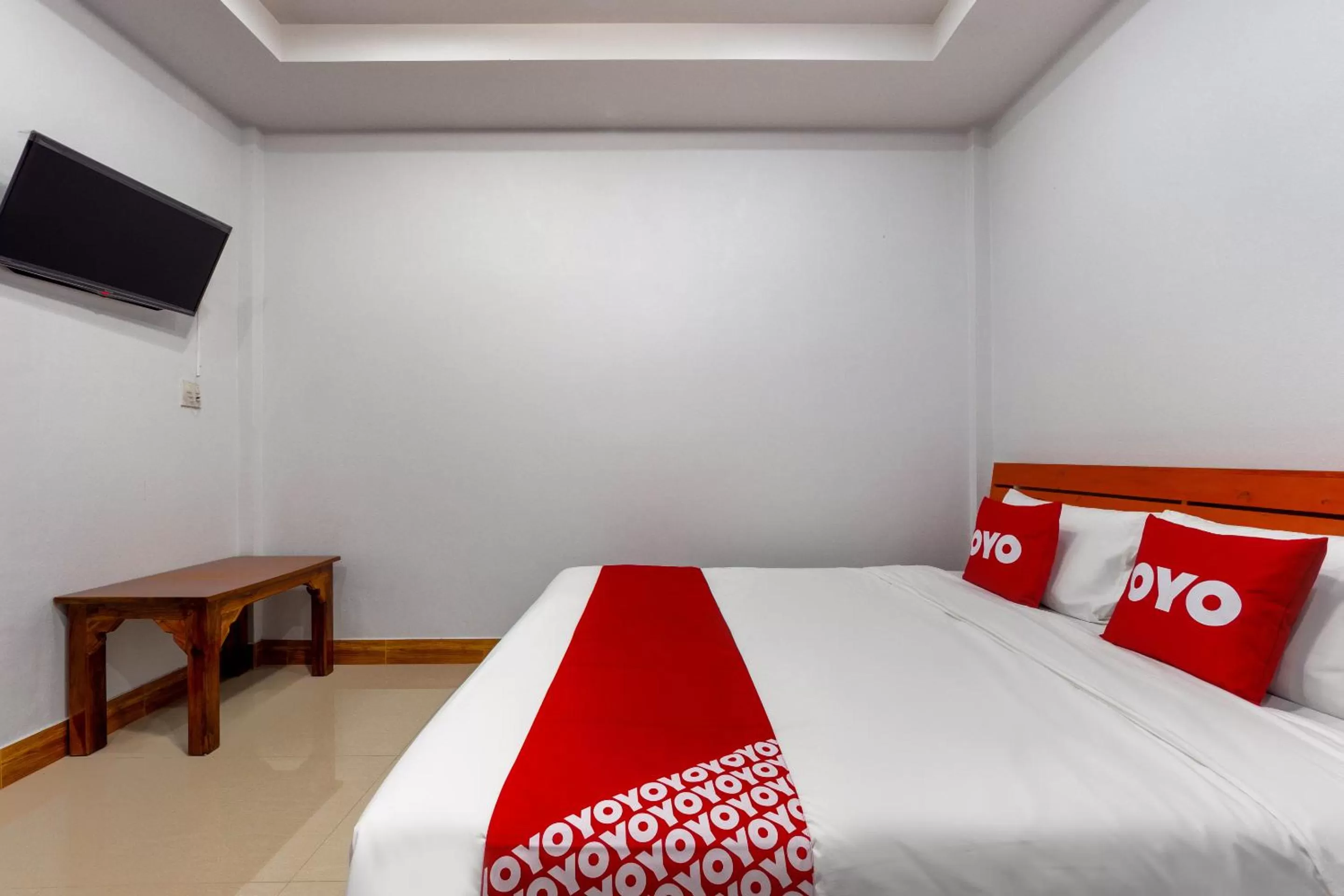Bedroom in OYO 1044 Vassana Resort