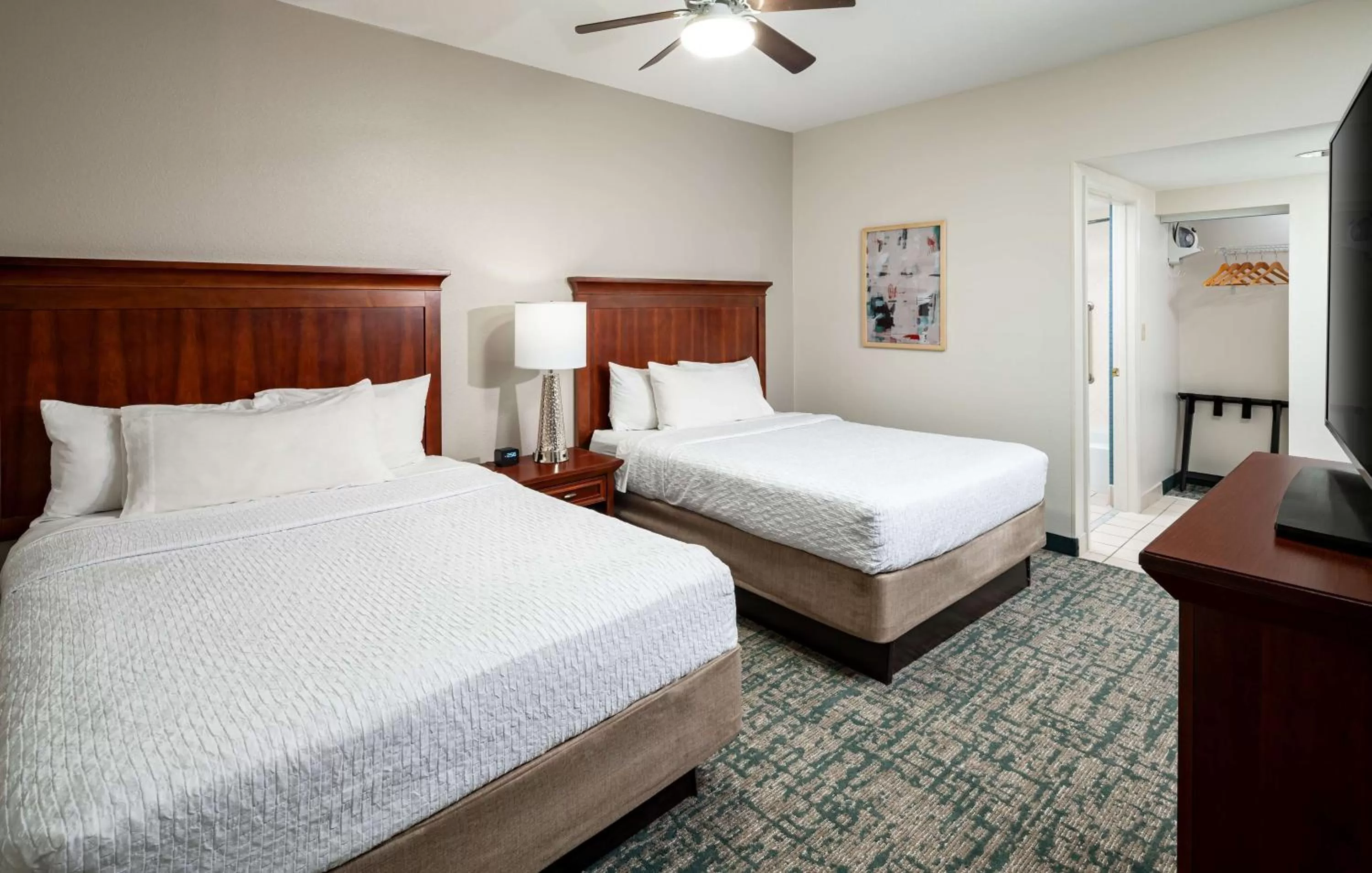 Bed in Homewood Suites by Hilton Jacksonville-South/St. Johns Ctr.