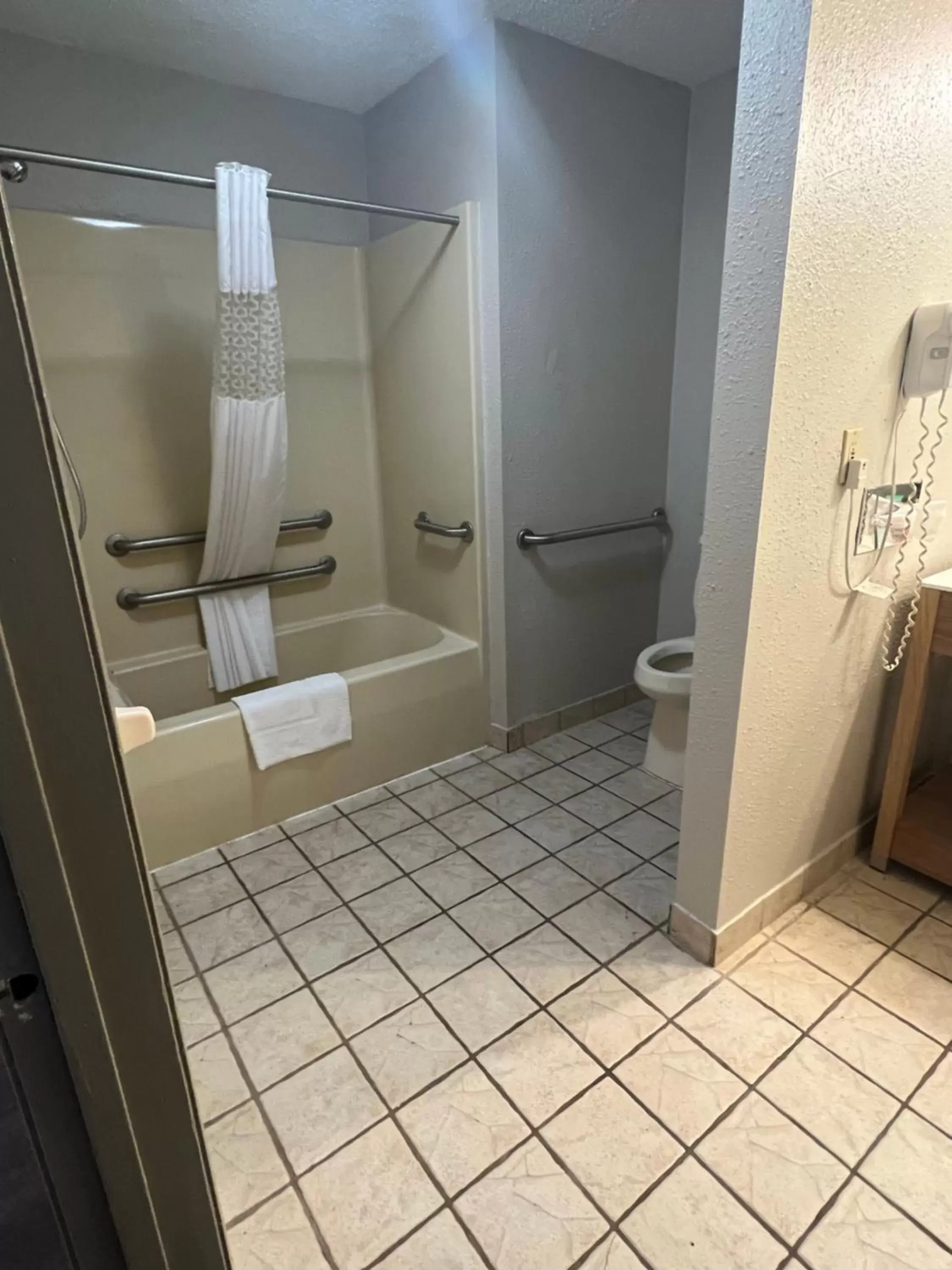 Shower, Bathroom in Days Inn & Suites by Wyndham Monroe