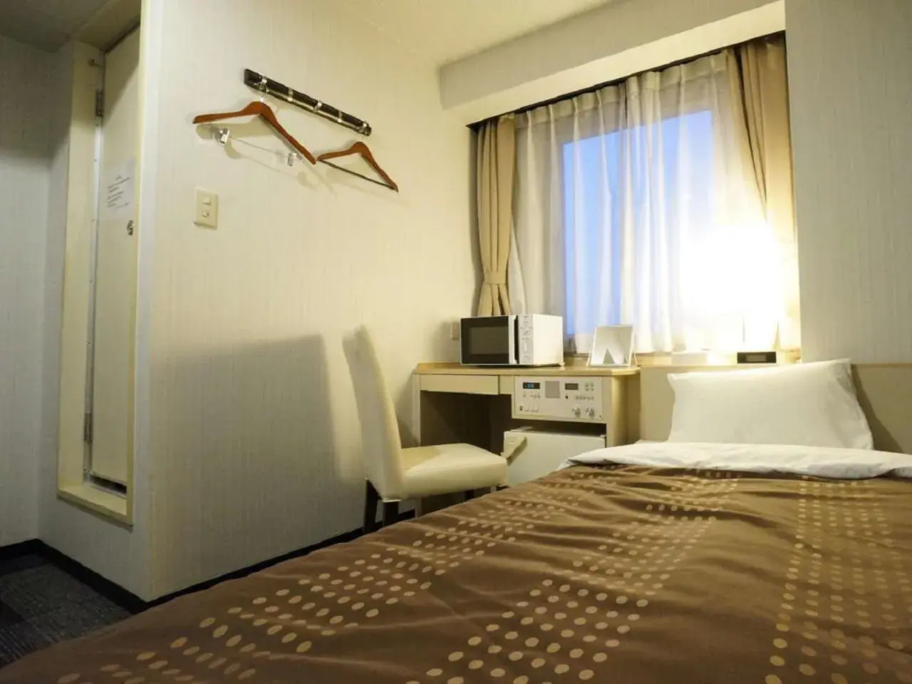 Bed in HOTEL LiVEMAX Kyoto Gojo