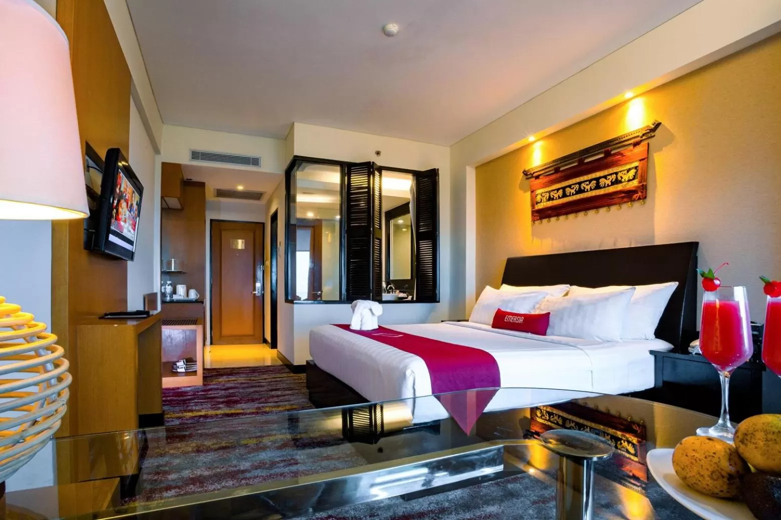 Bed in Emersia Hotel and Resort