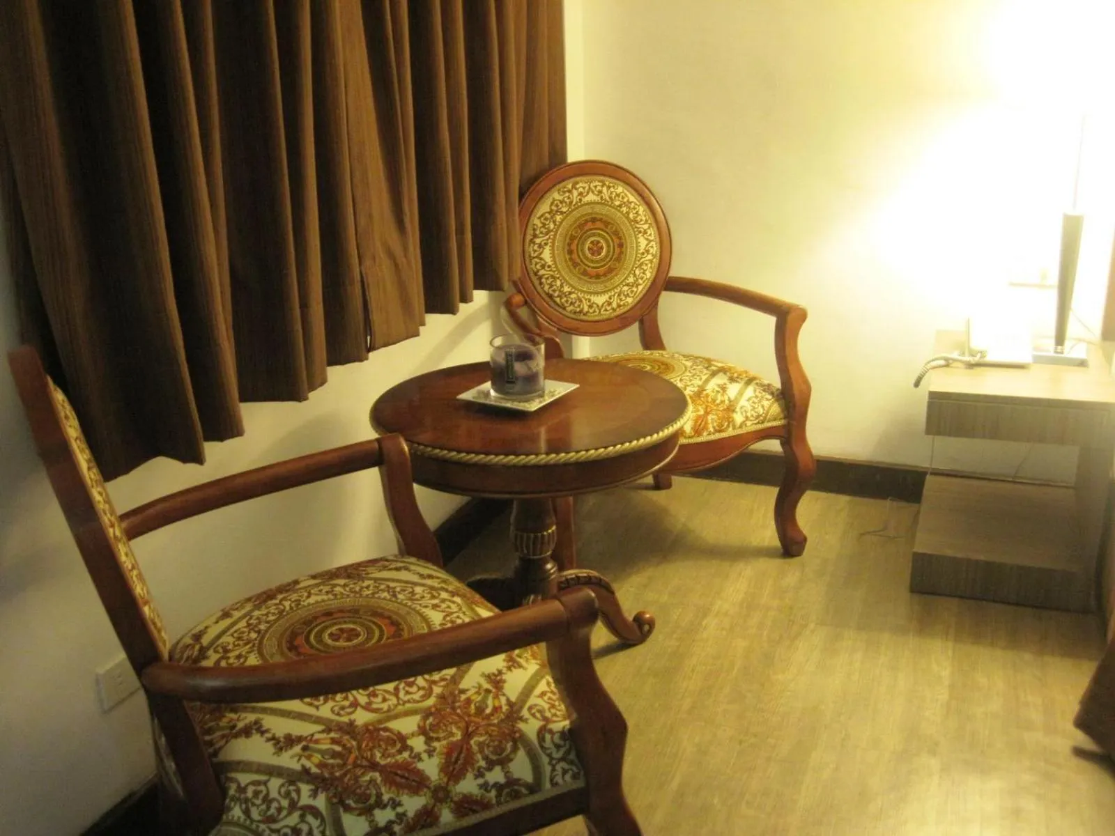 Seating area in Tyche Boutique Hotel