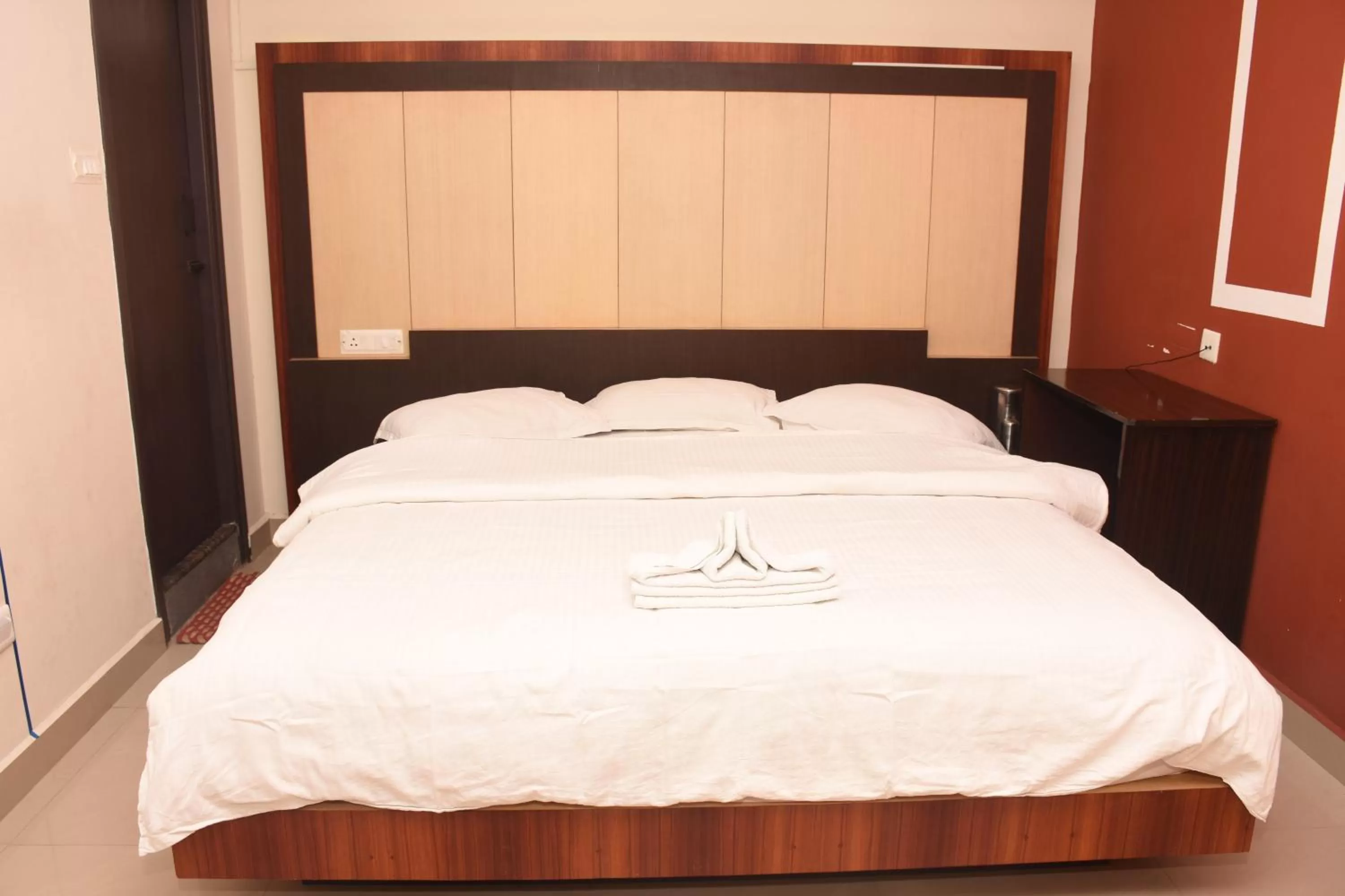 Bed in Star MSR Residency