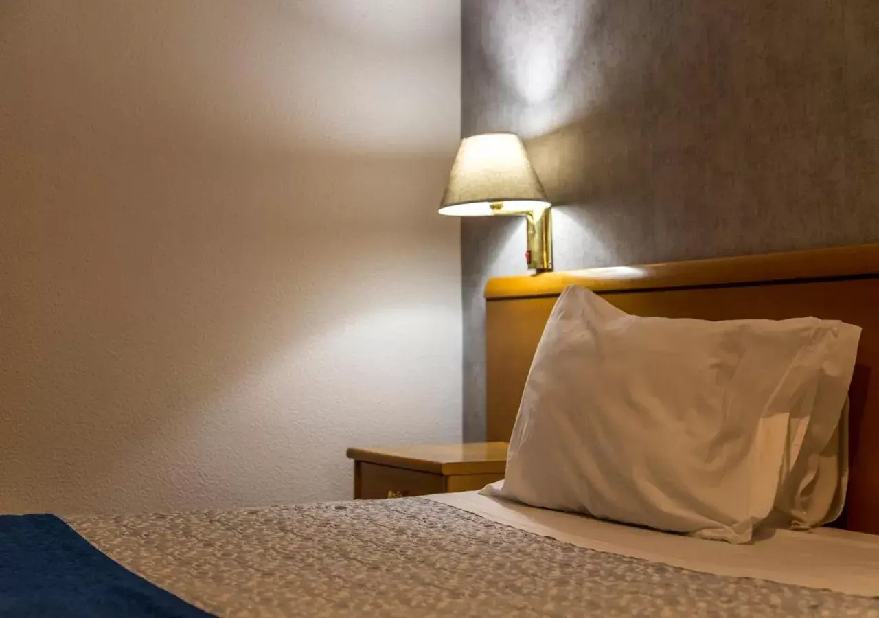 Bed in Hotel Columbano