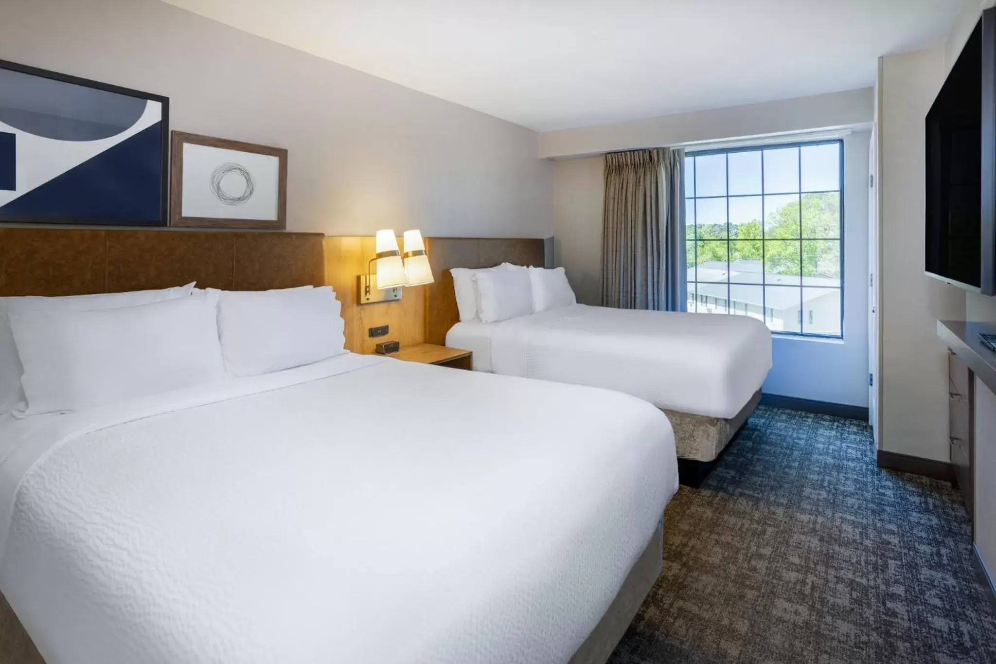 Photo of the whole room, Bed in Staybridge Suites Wilmington East, an IHG Hotel