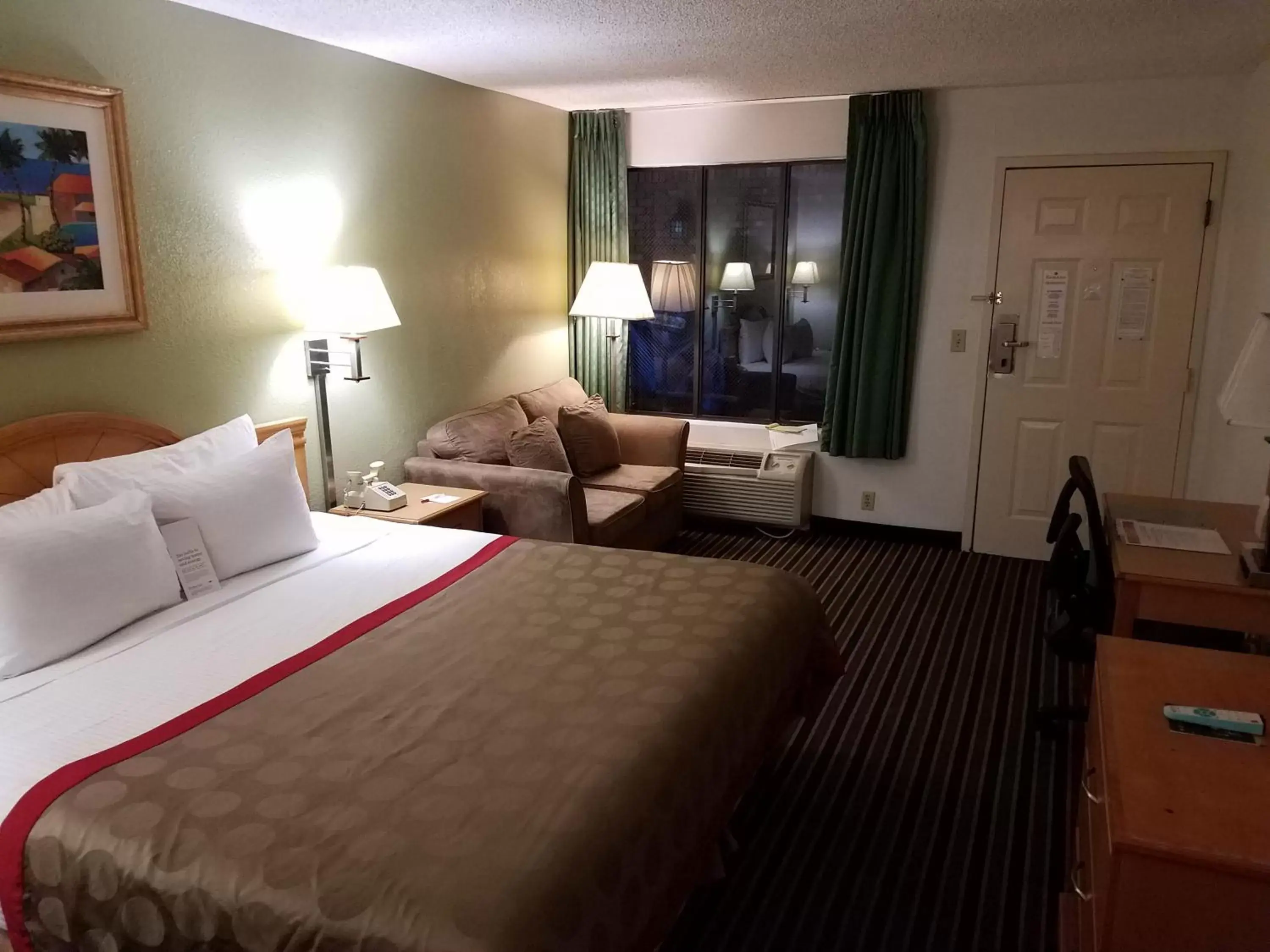 Bedroom, Bed in Ramada by Wyndham Temple Terrace/Tampa North