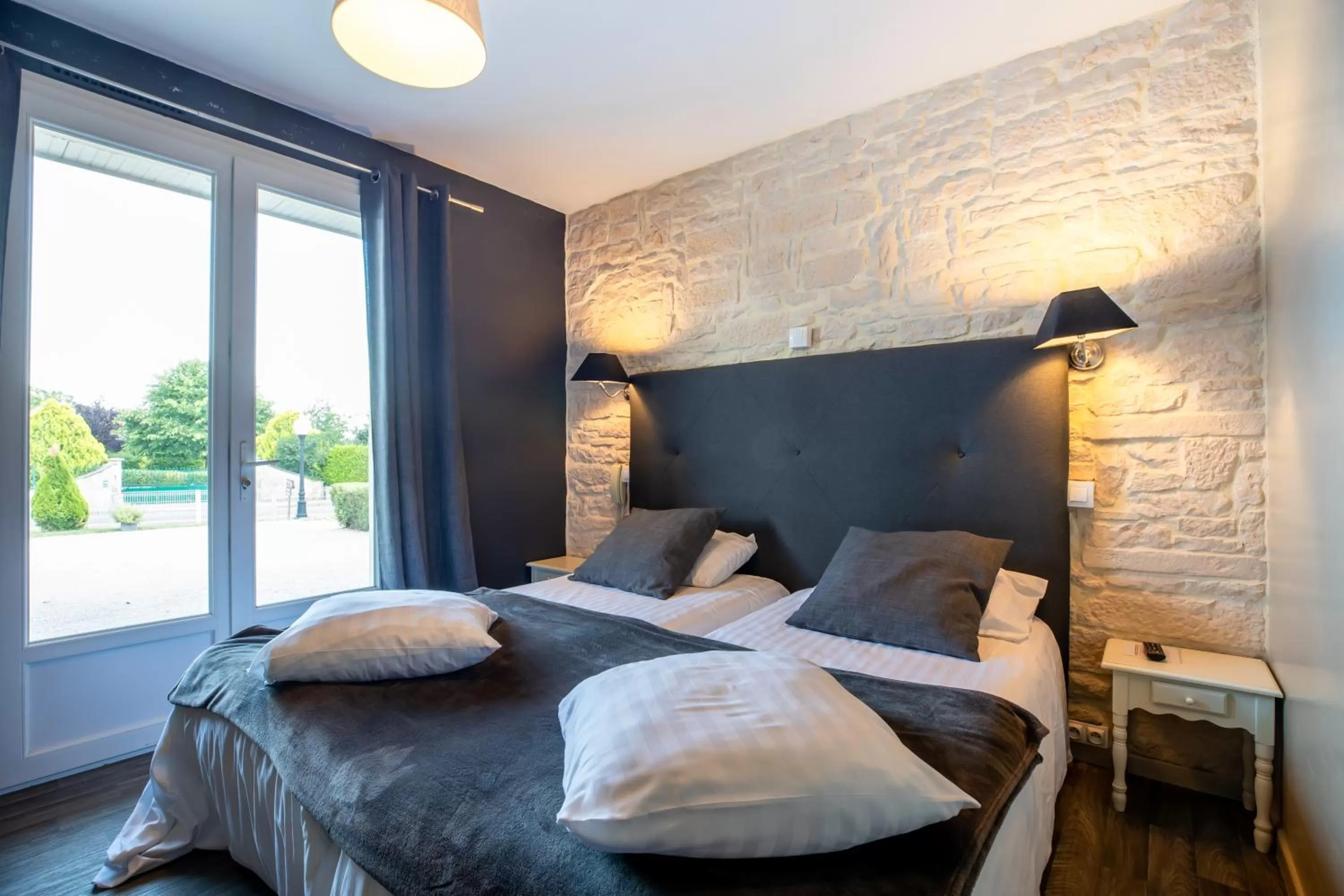 TV and multimedia, Bed in Hôtel Parc Adelie