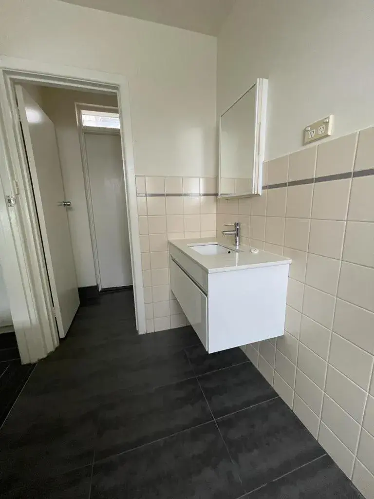 Bathroom in City Edge East Melbourne Apartment Hotel