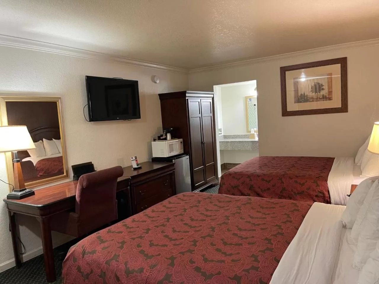 Bed in 1st Interstate Inn