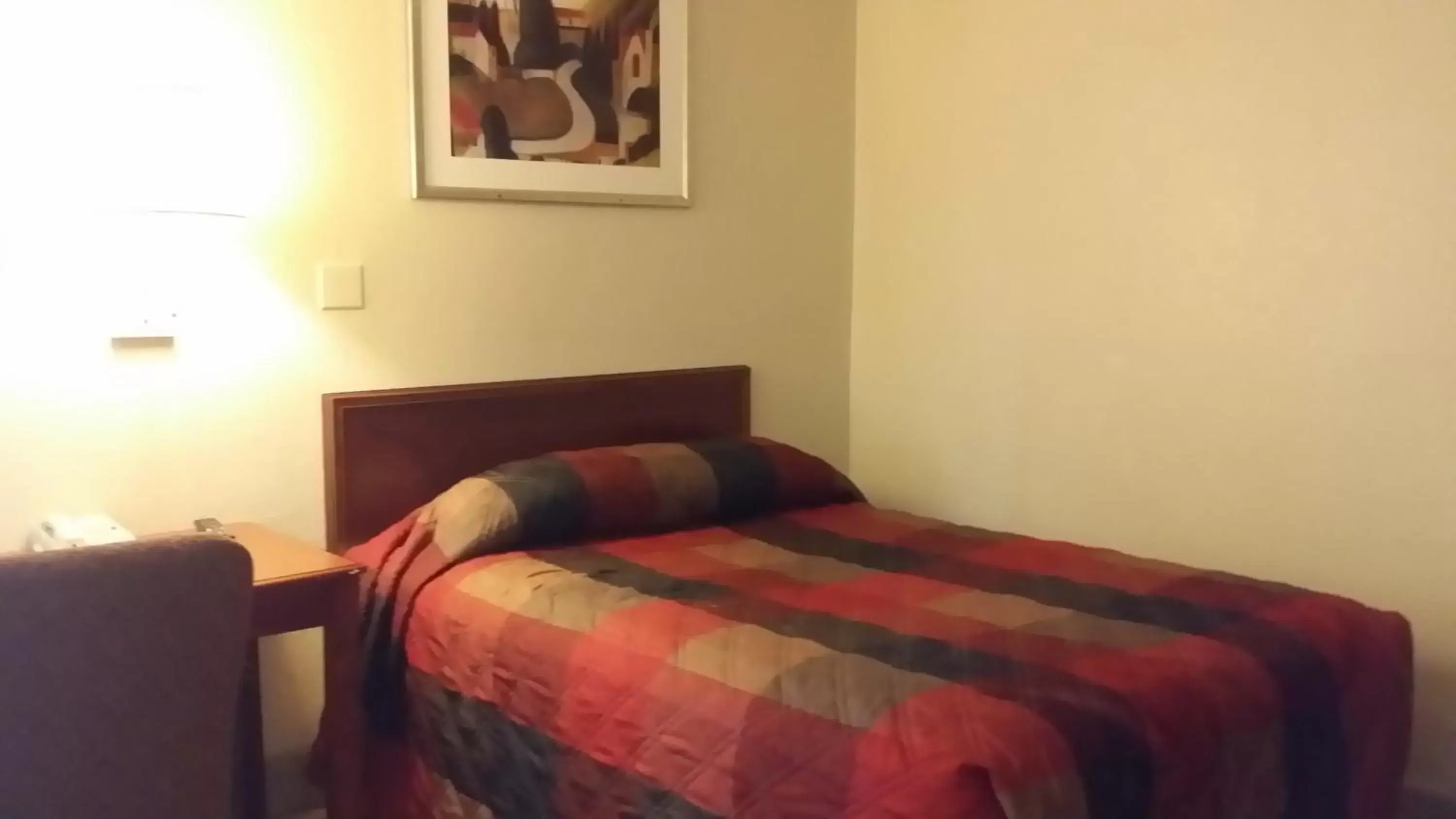 Bed in Carpet Inn
