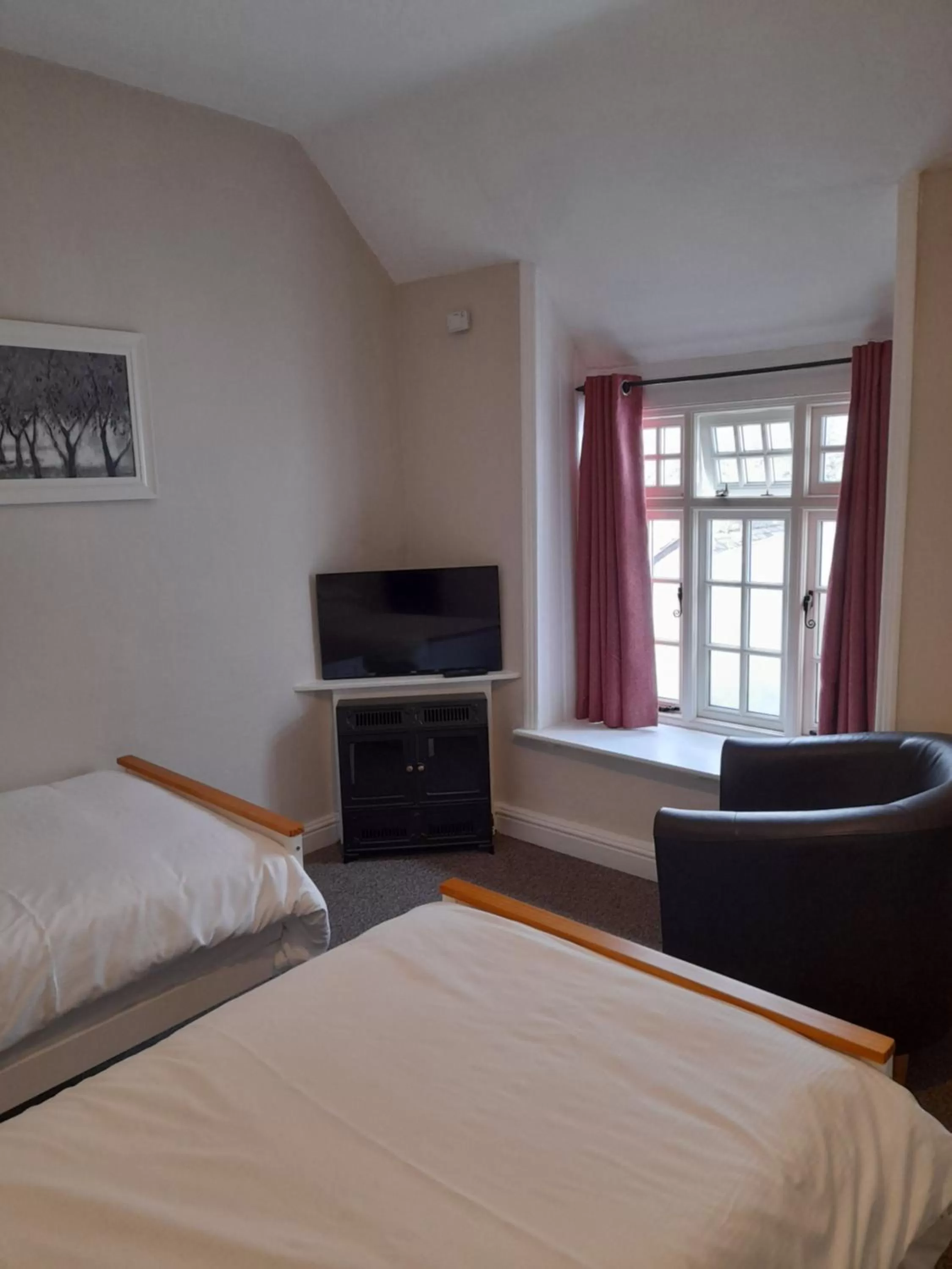 Bed in The Raven Inn