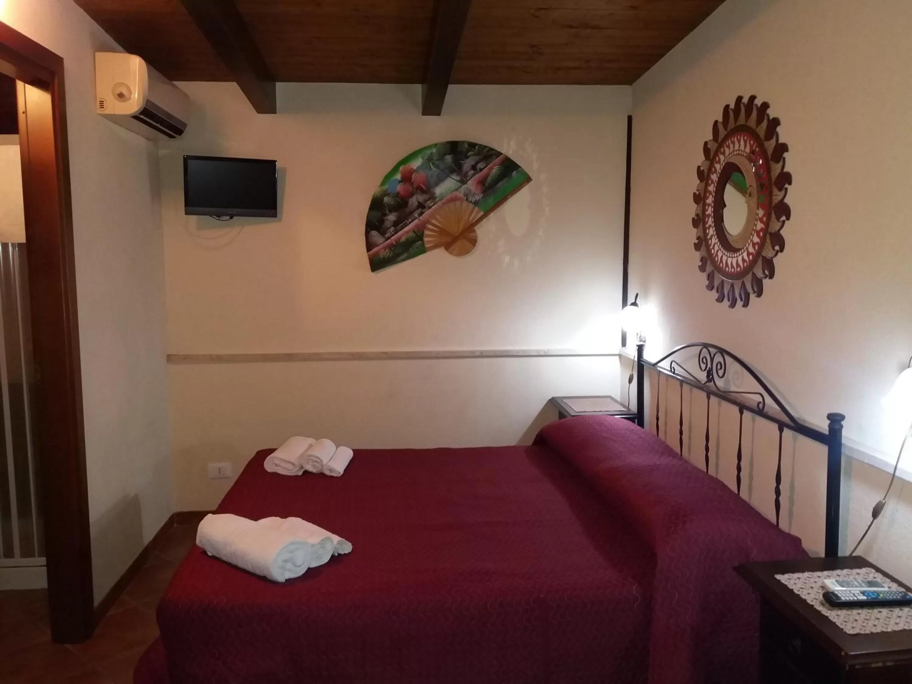 Bed in APPARTAMENTO A SAN VITO LO CAPO STANZA CON BAGNO
