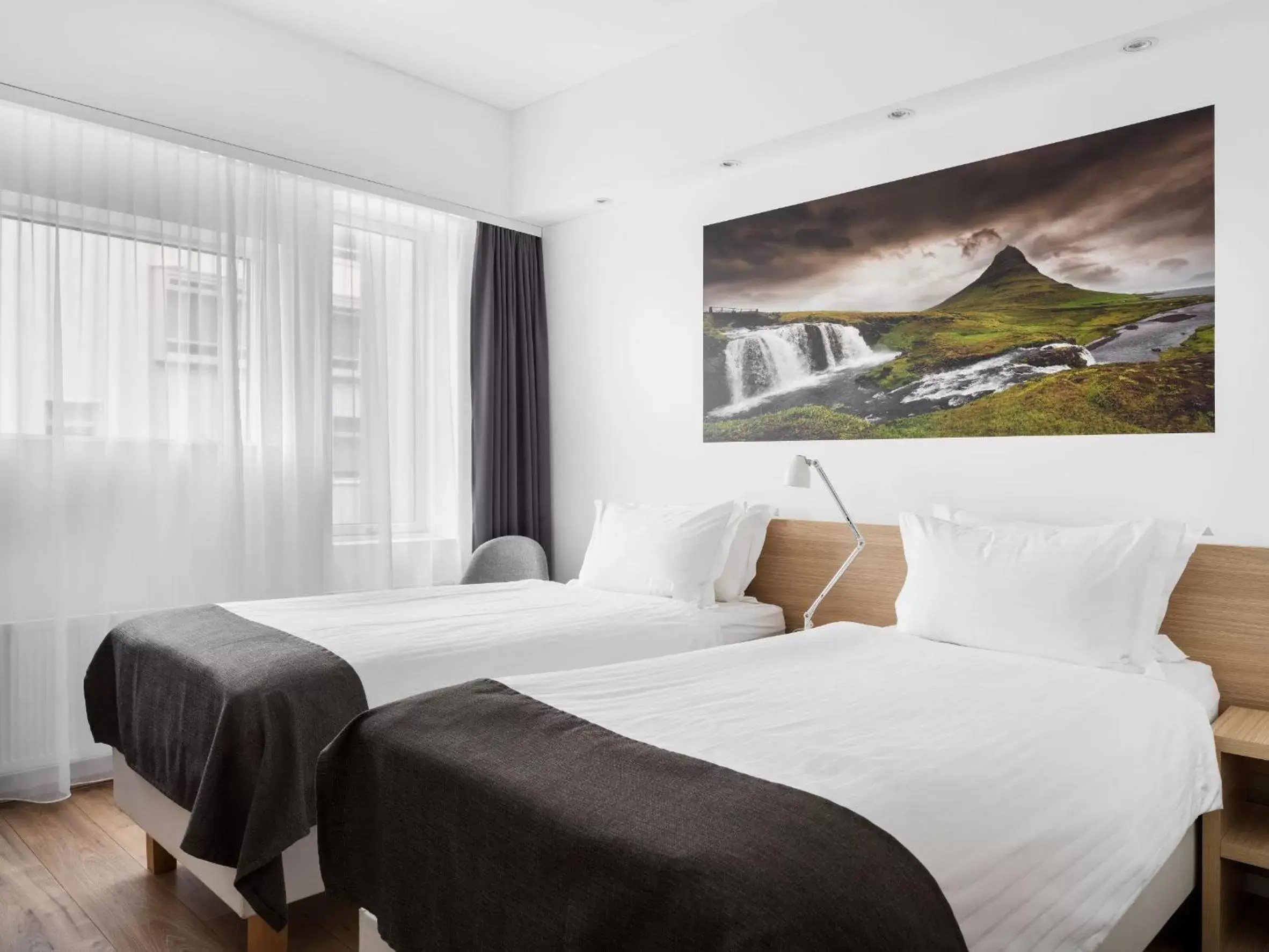Bed in Storm Hotel by Keahotels