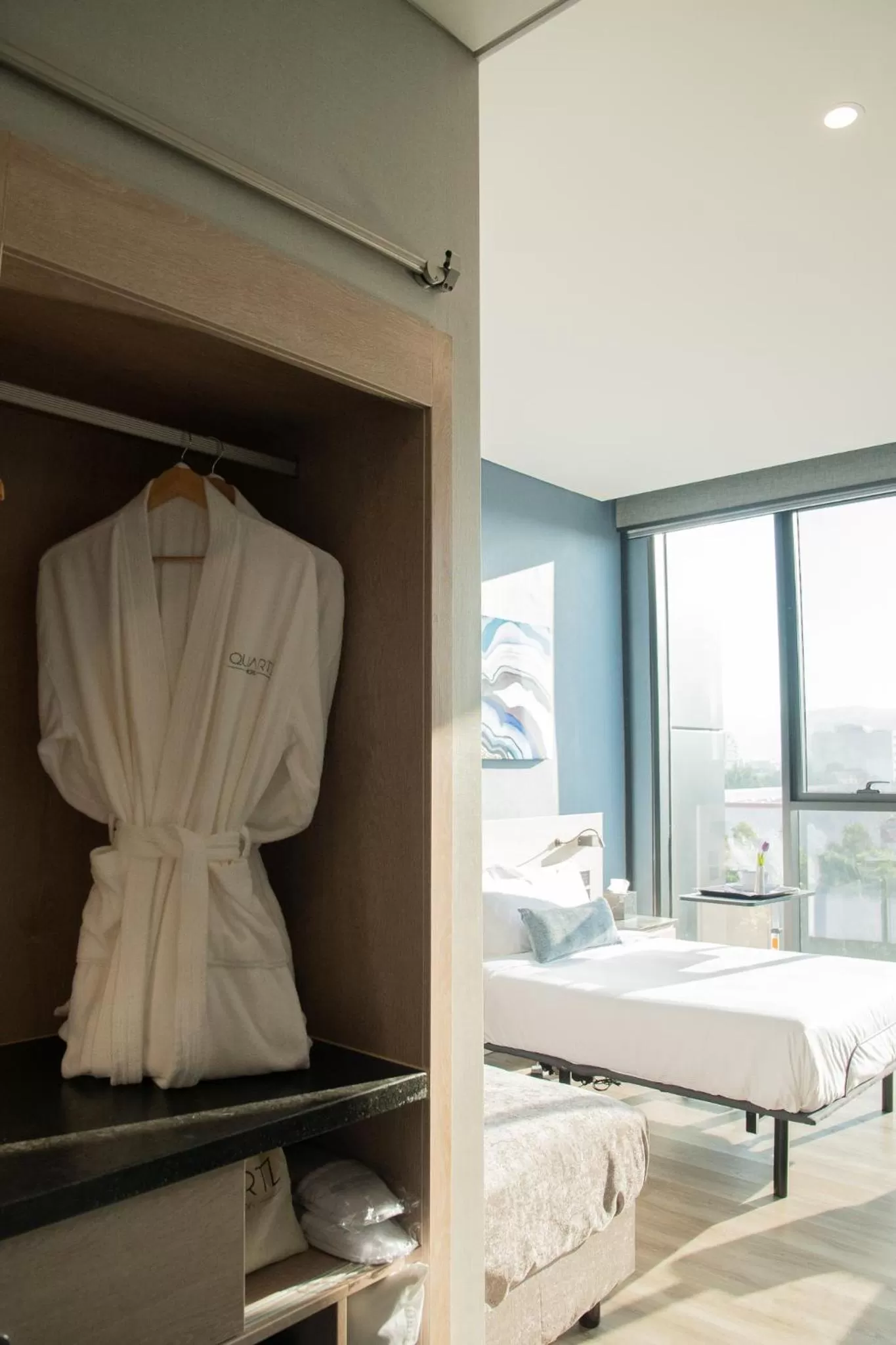 Bed in QUARTZ HOTEL & SPA