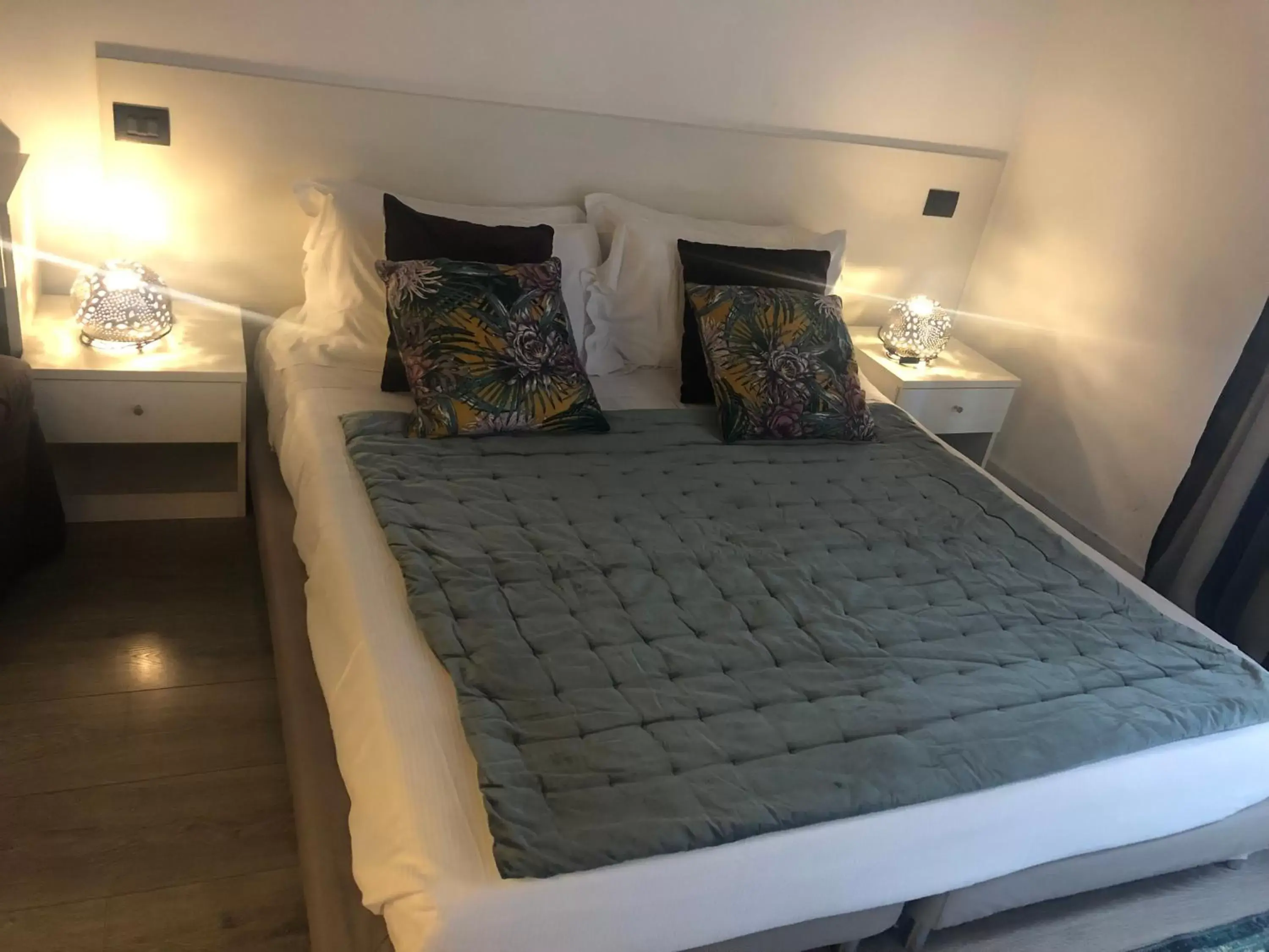 Bed in Giuturna Boutique Hotel